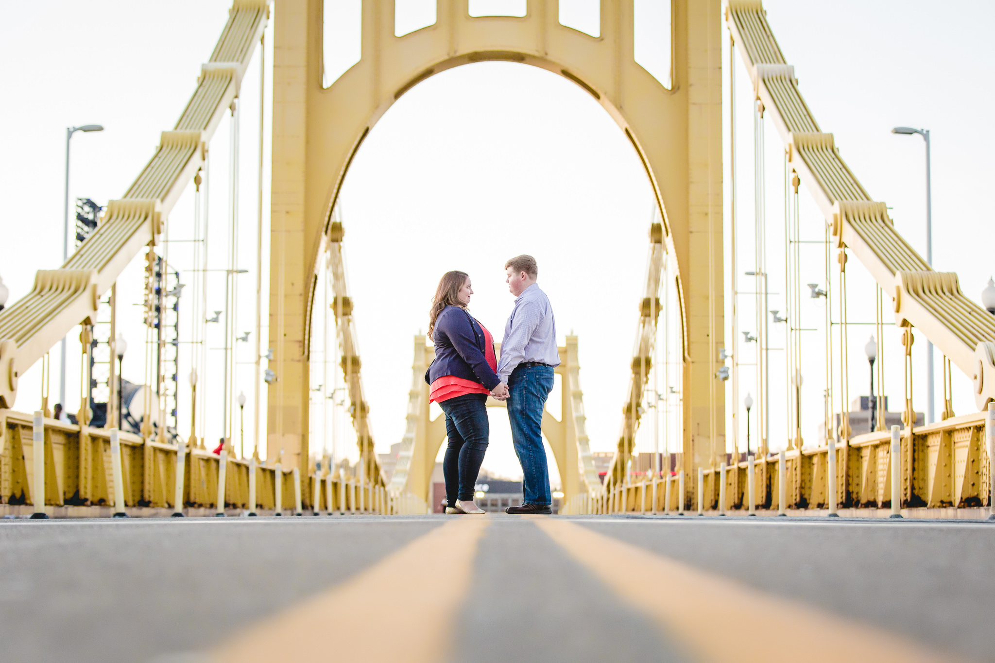 Engagement photos on the Roberto Clemente Bridge in Pittsburgh, PA