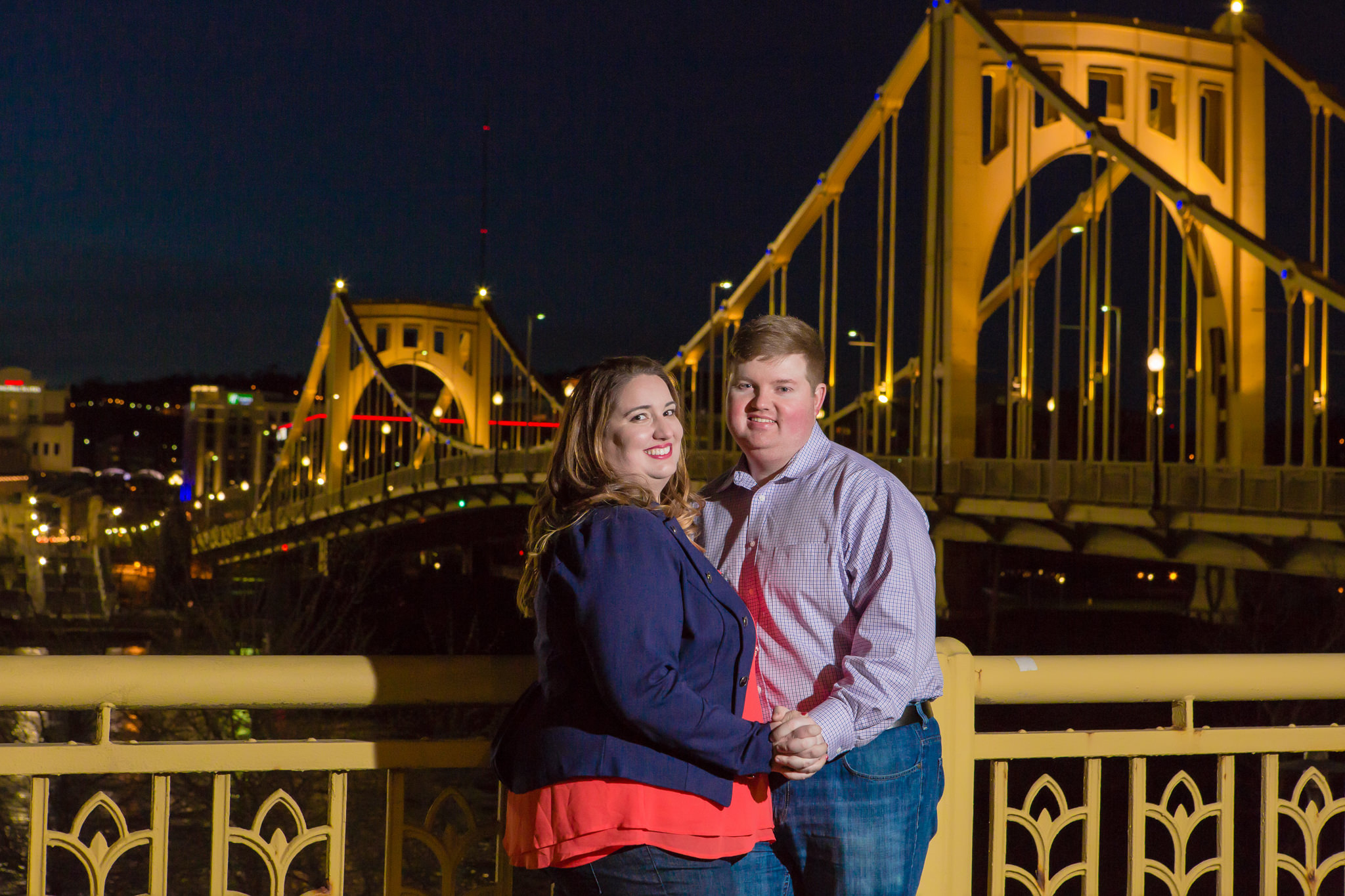 Engagement session at night by the Roberto Clemente Bridge