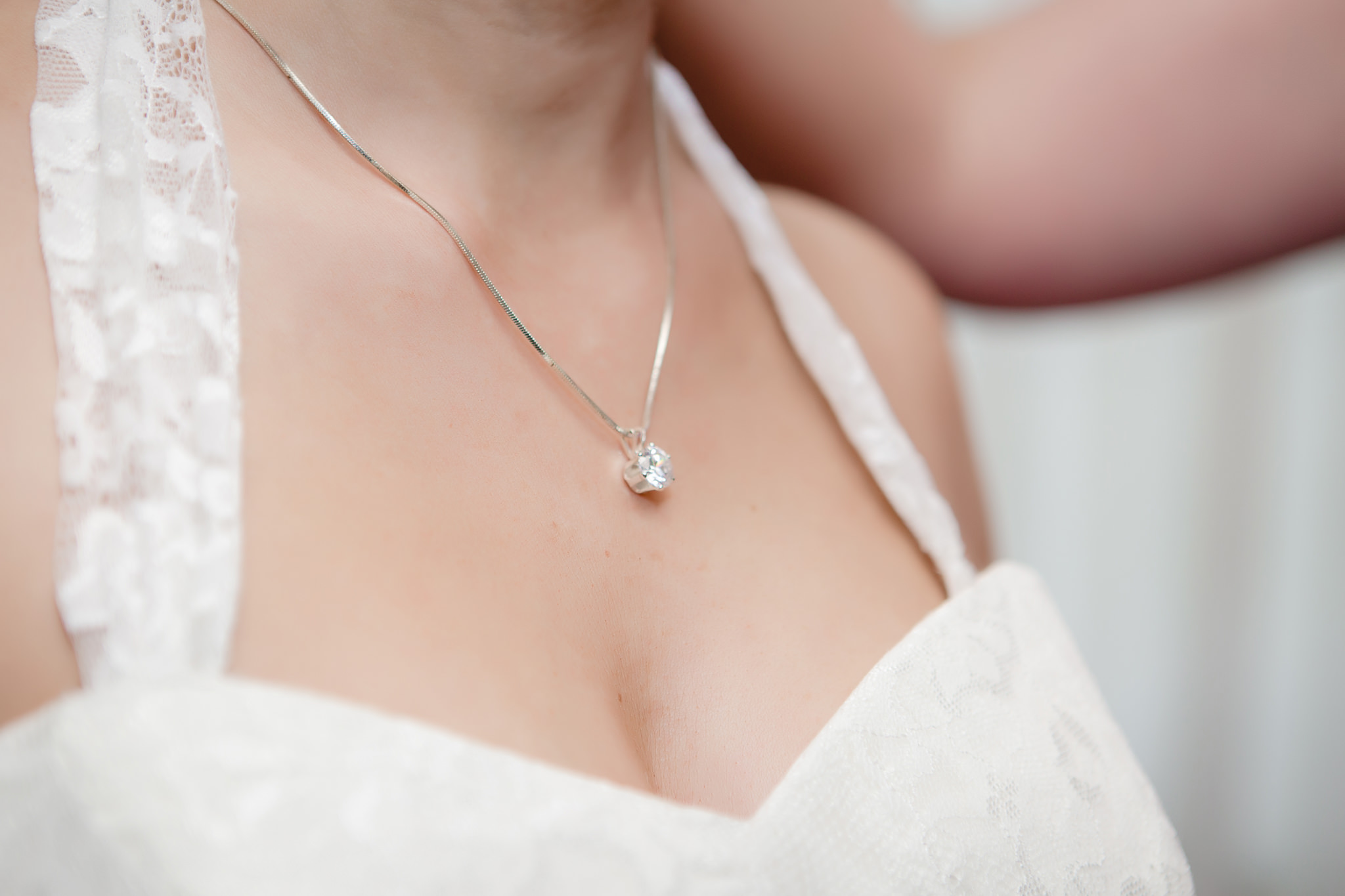Diamond necklace on the bride before her wedding ceremony at St. Malachy Catholic Church