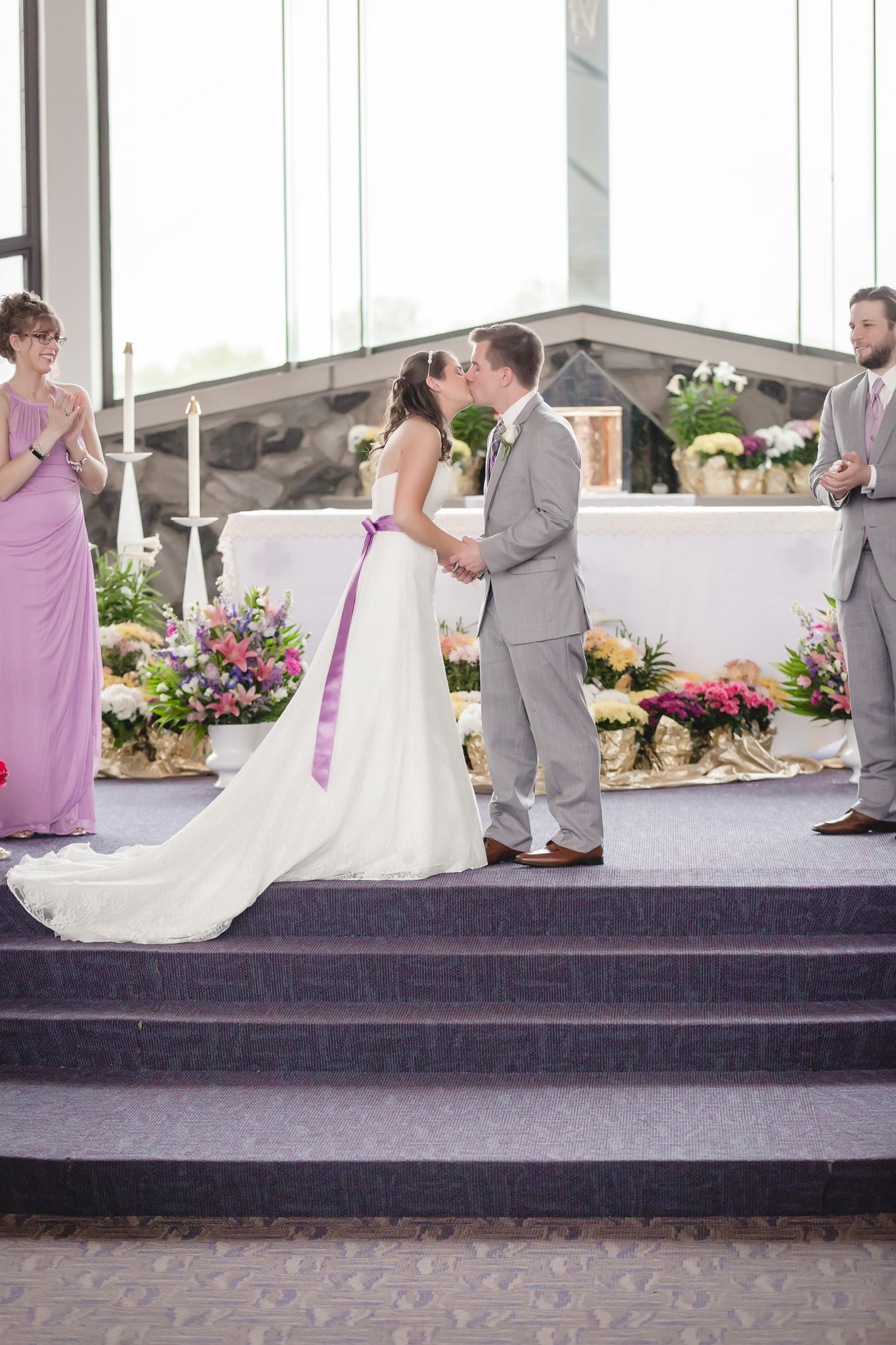 First kiss at wedding ceremony at St. Malachy Catholic Church
