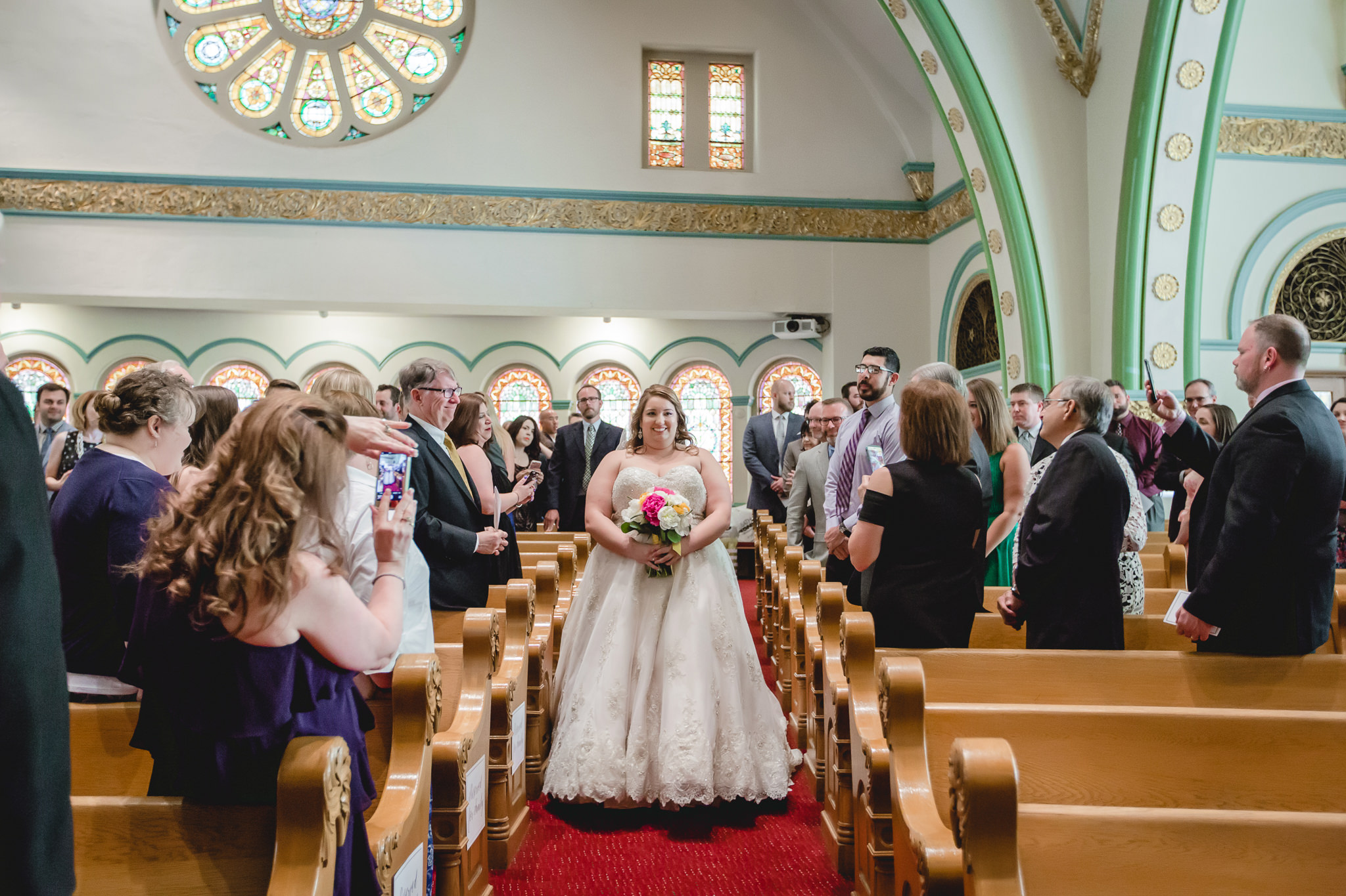 Bride walks down the aisle at Bellefield Presbyterian in Pittsburgh