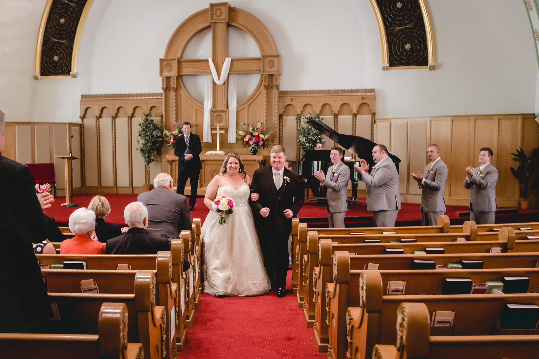 Bride and groom leaving their ceremony at Bellefield Presbyterian in Pittsburgh