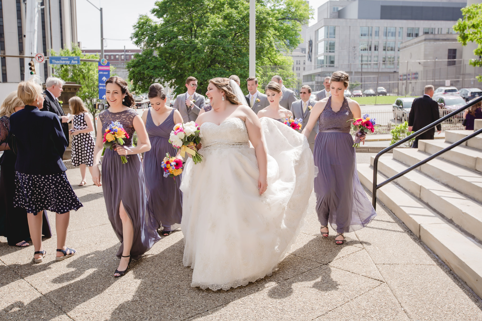 Bride and bridesmaids laughing at Bellefield Presbyterian in Pittsburgh