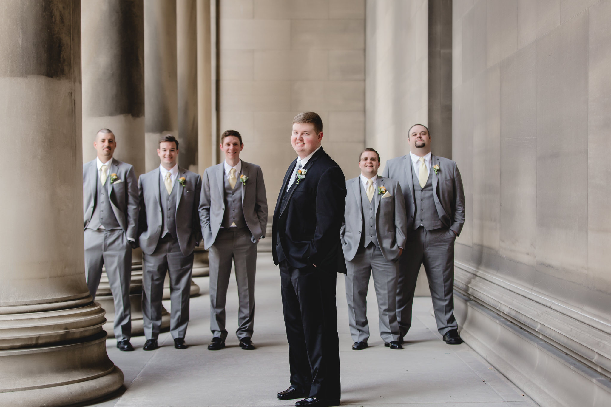 Groom with groomsmen at the CMU columns in Oakland Pittsburgh