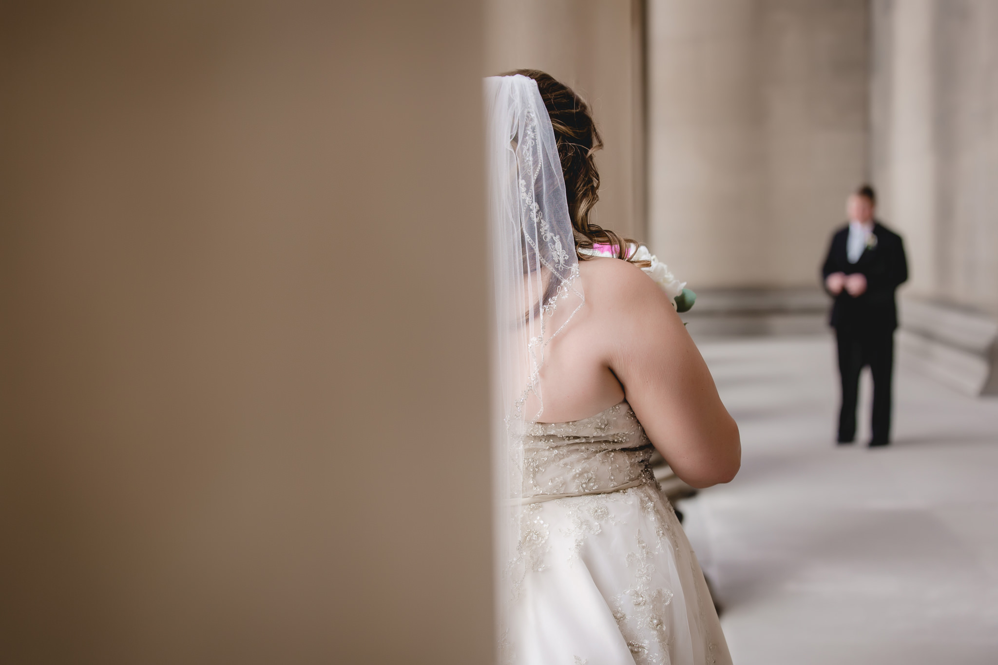 Bride looking at her groom at the Mellon Institute in Pittsburgh
