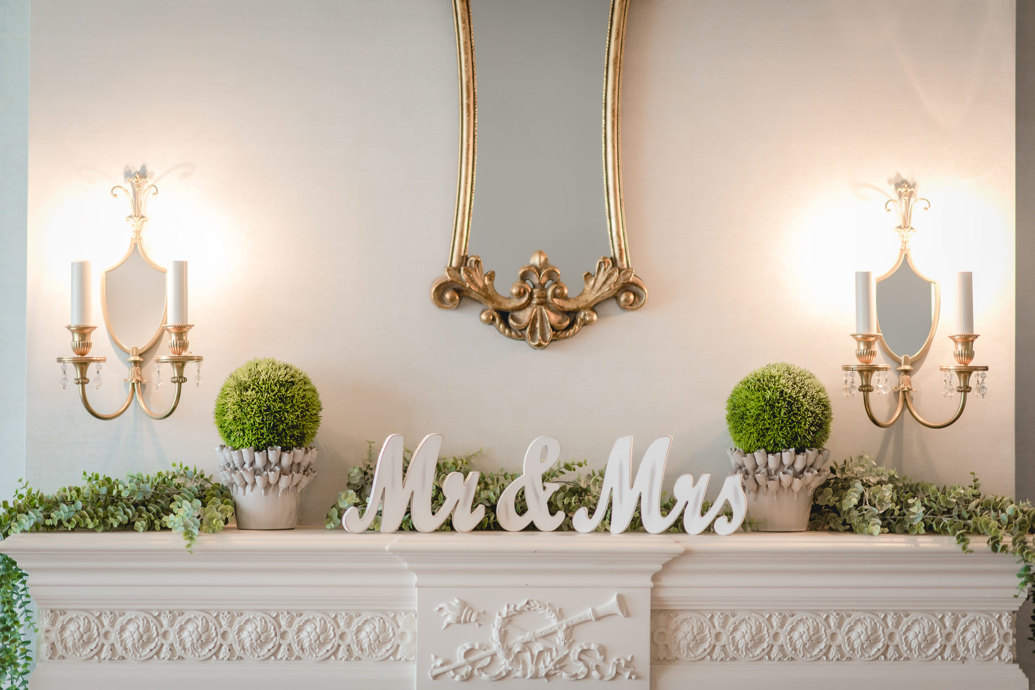 Mr & Mrs signs on a mantle inside Linden Hall mansion