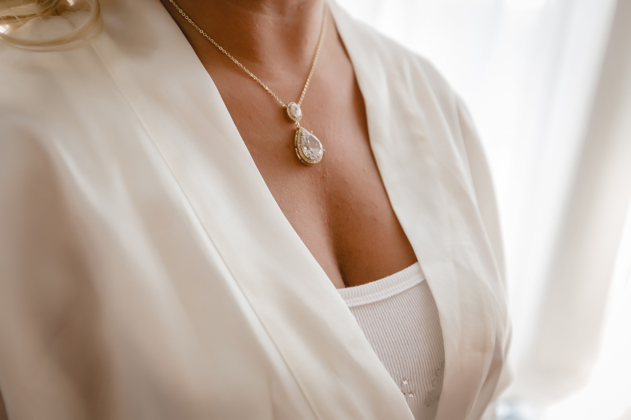 Closeup of bride's diamond necklace at Linden Hall