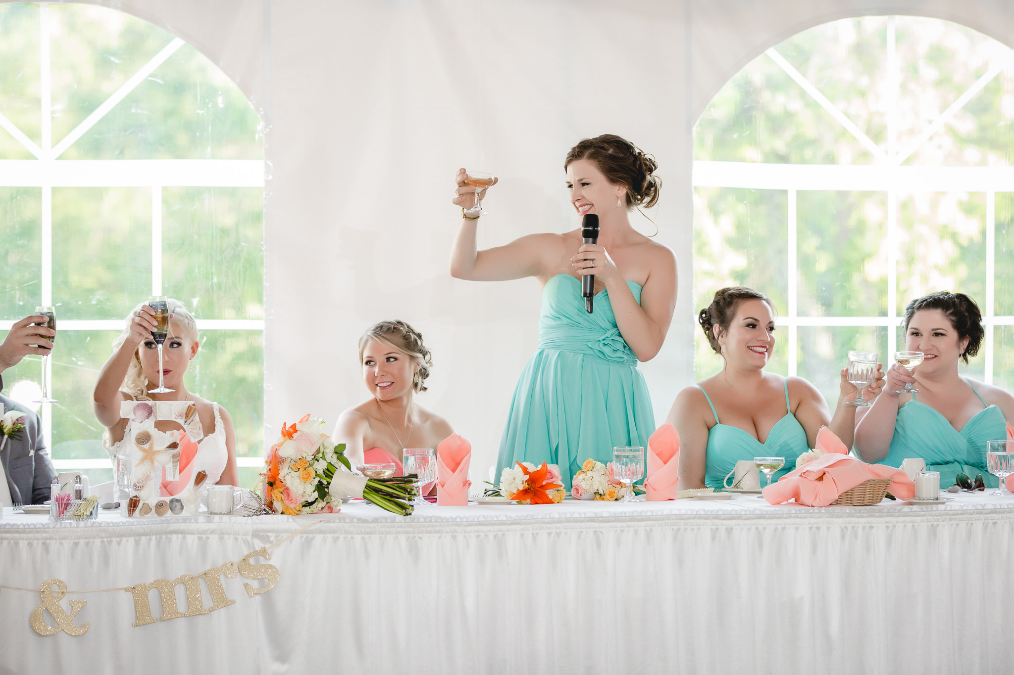 Matron of honor toasts the bride and groom