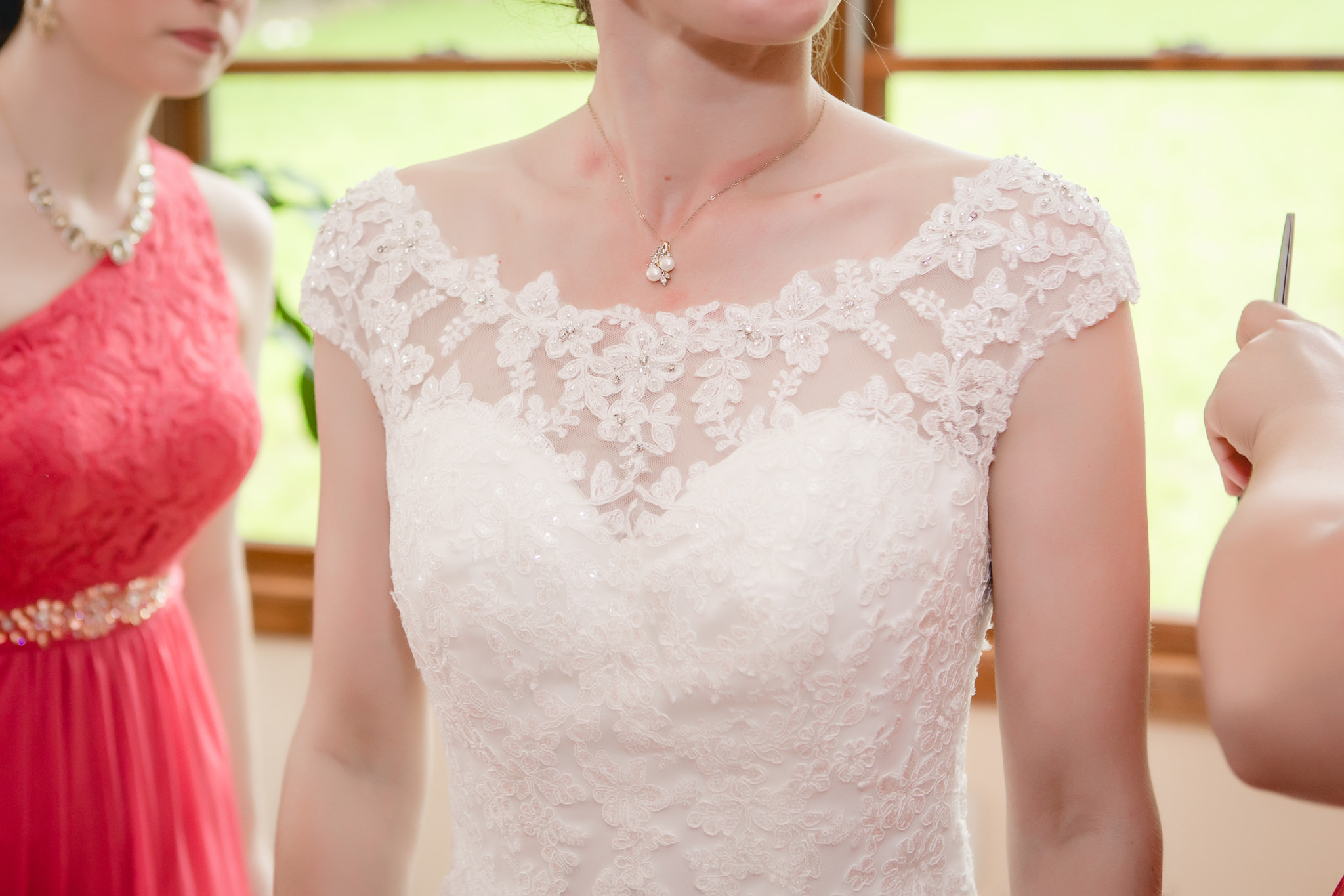 Bride wears pearl necklace and lace gown for her Shannopin Country Club wedding