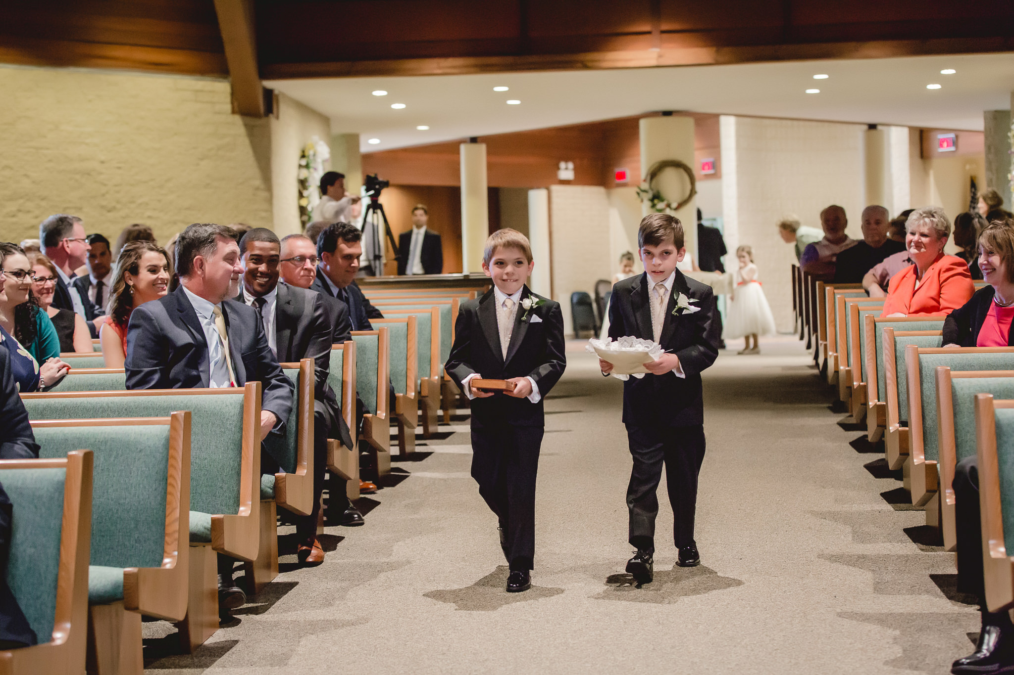 Ring bearers during ceremony at St. John Neumann Church in Pittsburgh PA