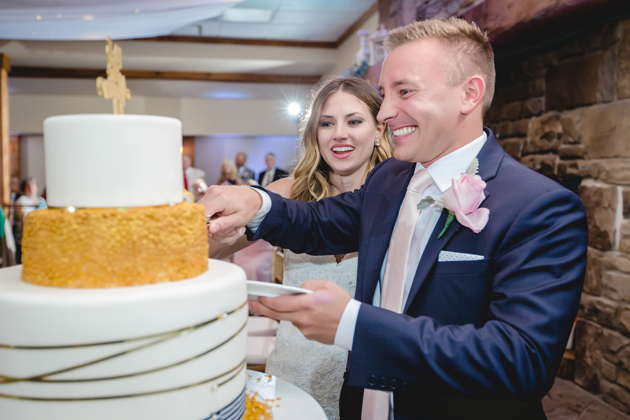 Bride and groom cut the cake at Hidden Valley Resort