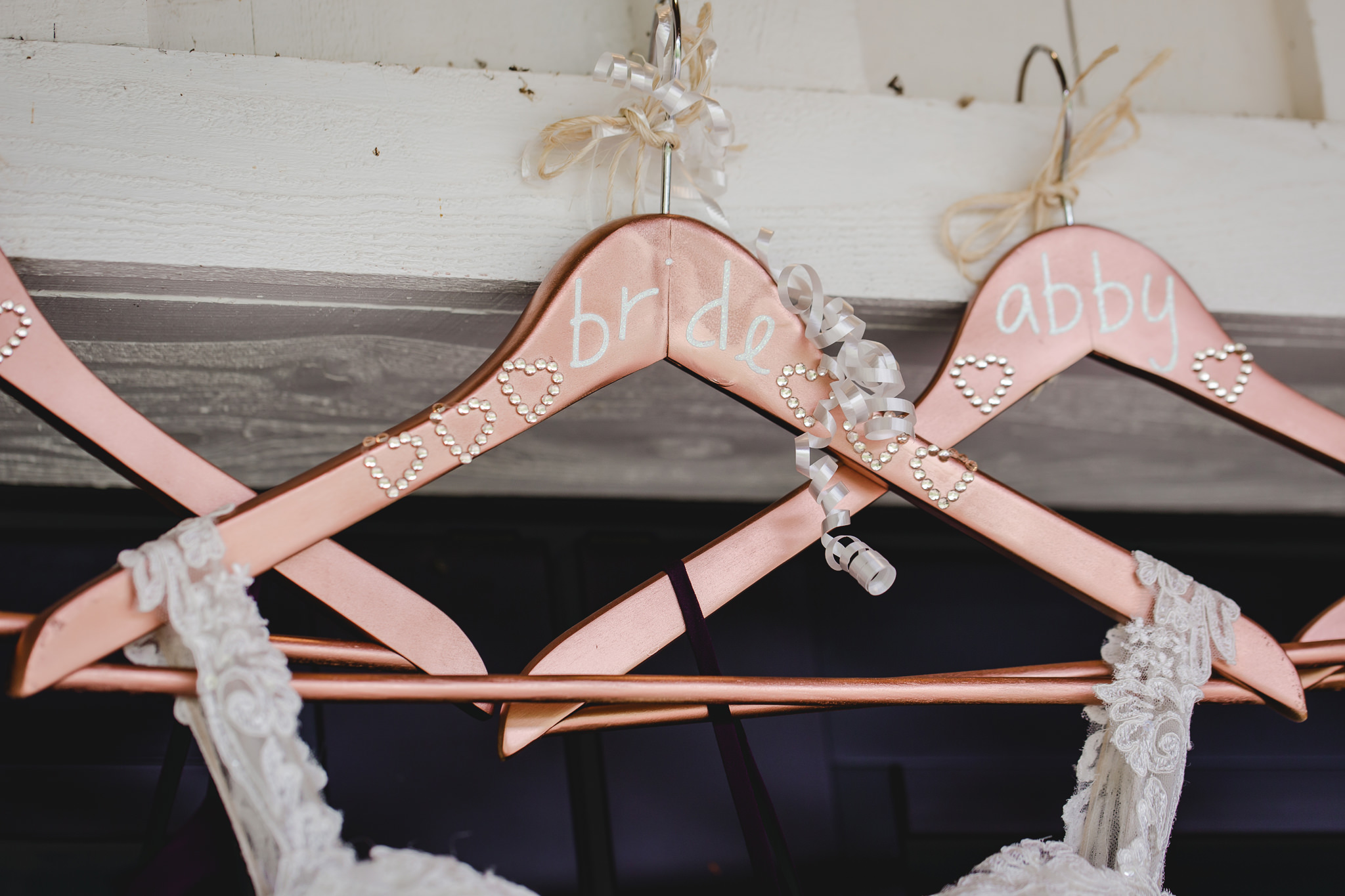 Hand-painted wooden hangers for the bride's dress