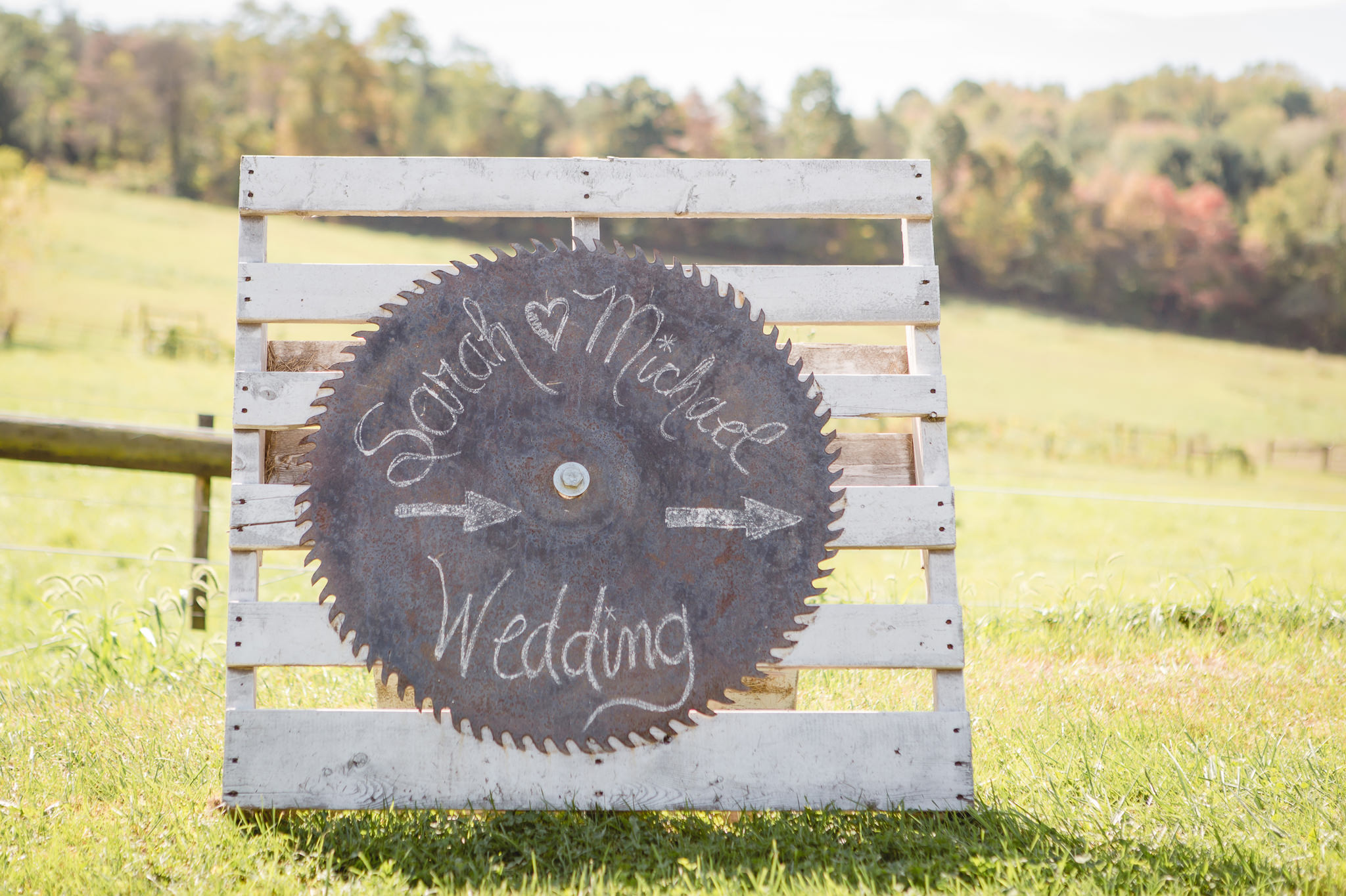 Custom chalk wedding sign for the bride and groom at the Barn at Soergel Hollow