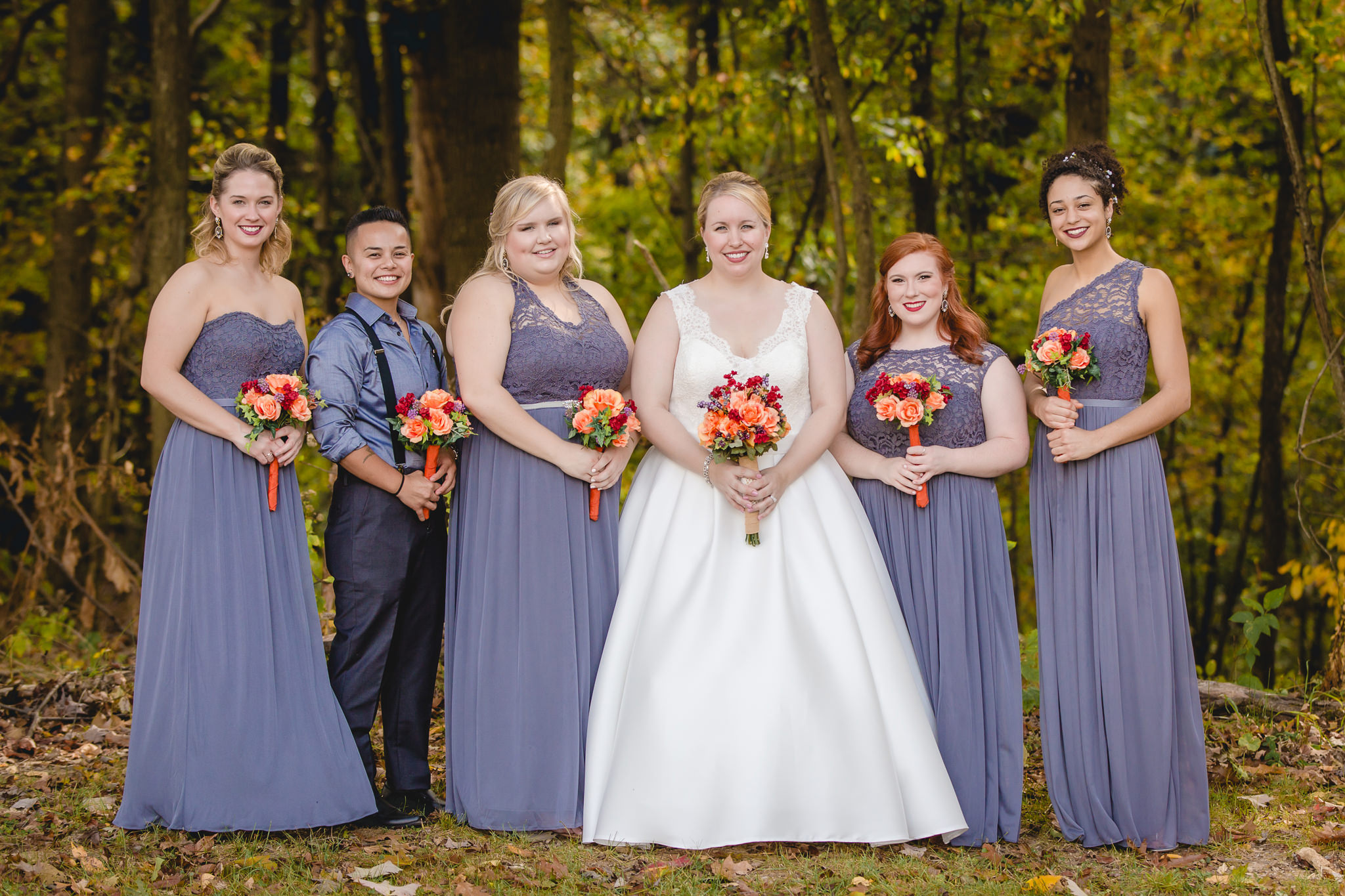 Bride and her bridesmaids at her October wedding at the Barn at Soergel Hollow