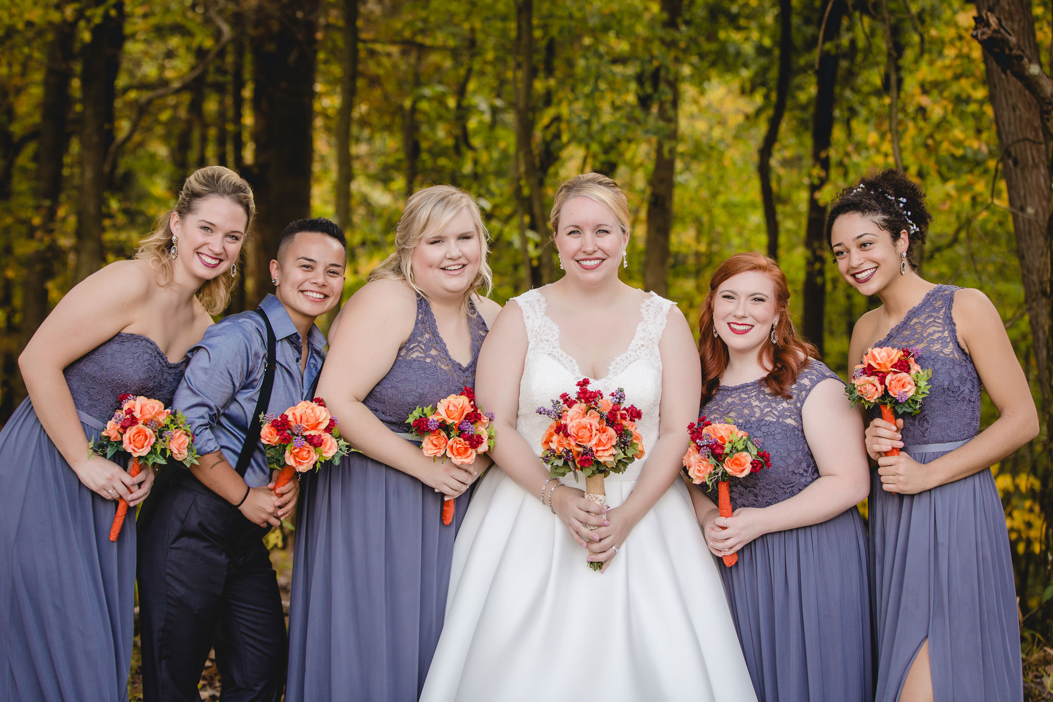 Bride and her bridesmaids with gray dresses from David's Bridal