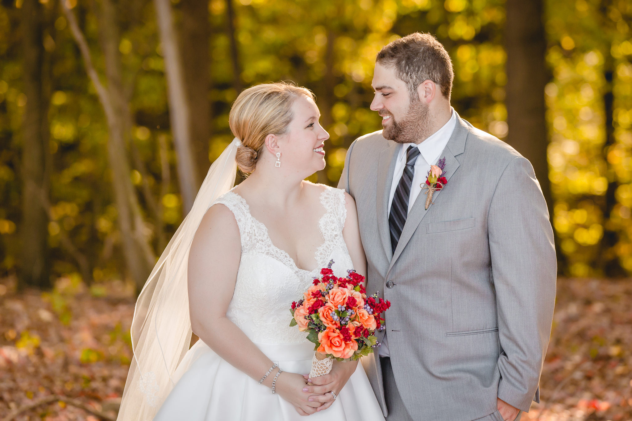 Bride and groom gaze at each other at the Barn at Soergel Hollow