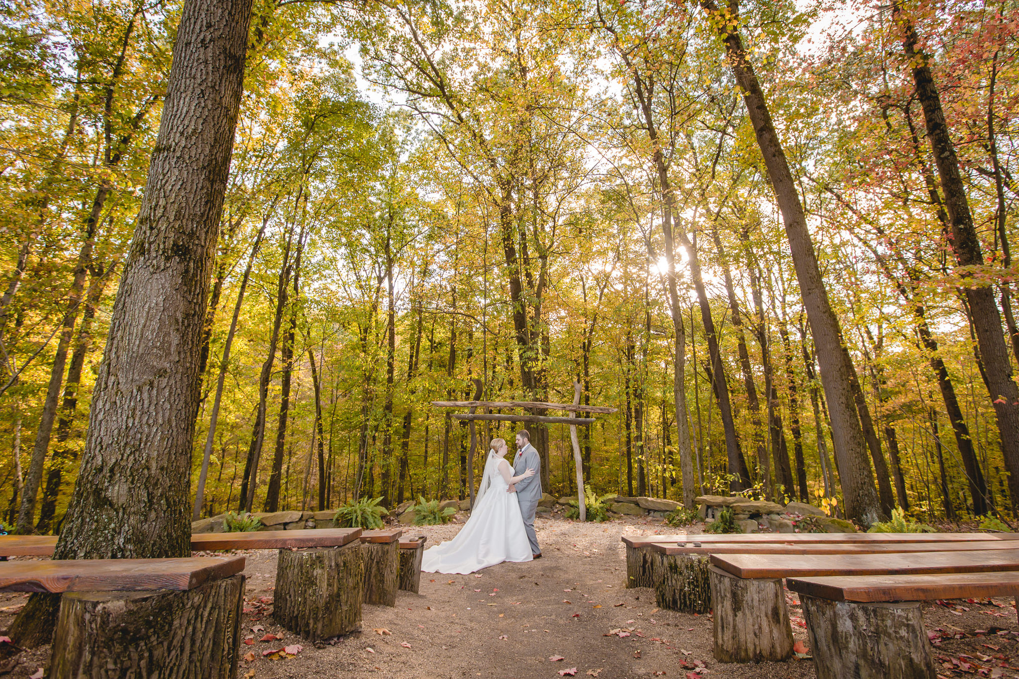 Bride and groom at the ceremony location at the Barn at Soergel Hollow