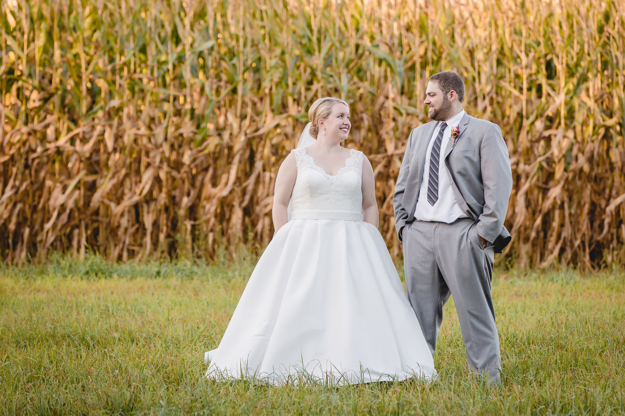 Bride and groom with their hands in their pockets at the Barn at Soergel Hollow