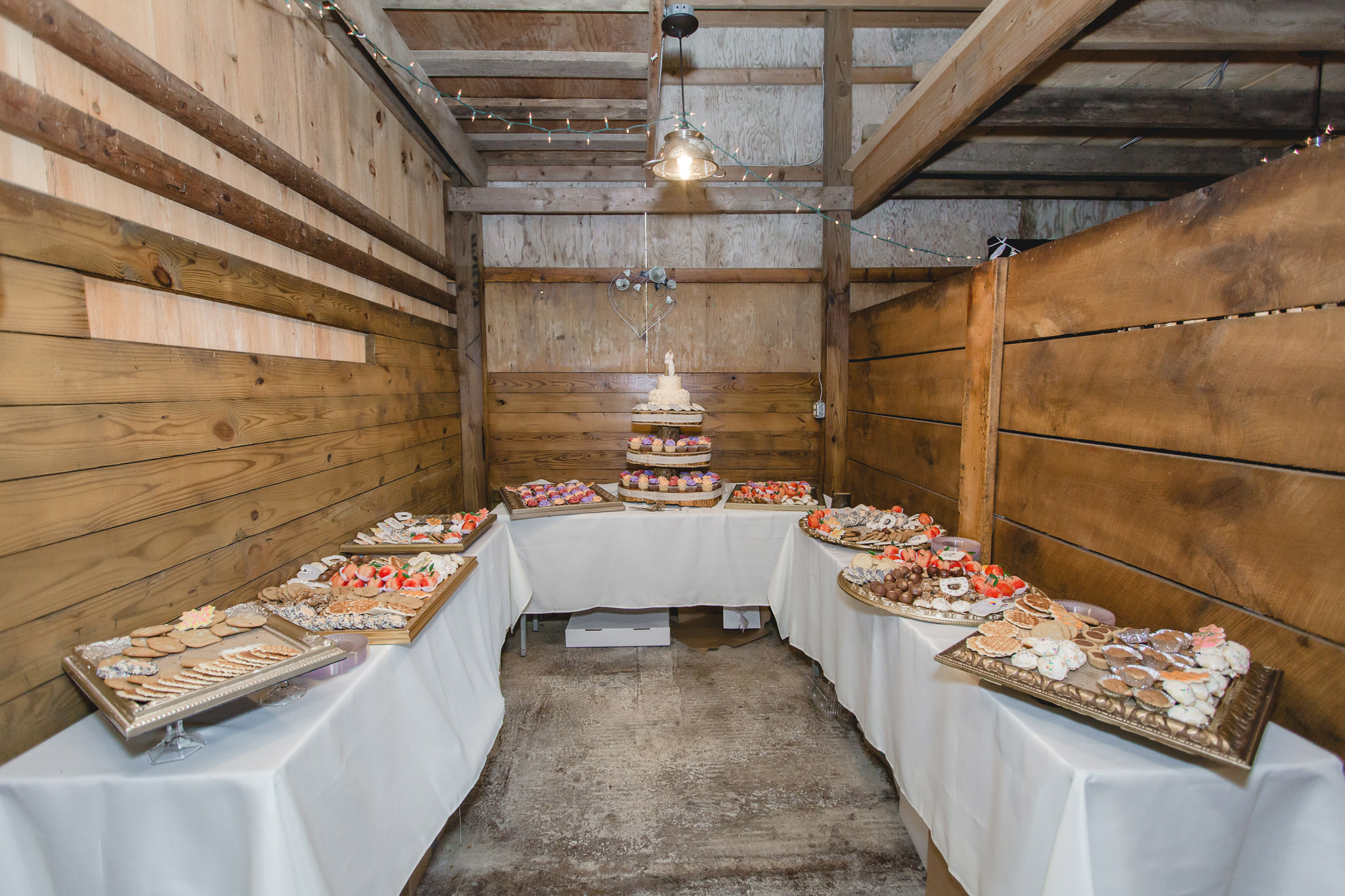 Wedding cake and cookie table layout at the Barn at Soergel Hollow