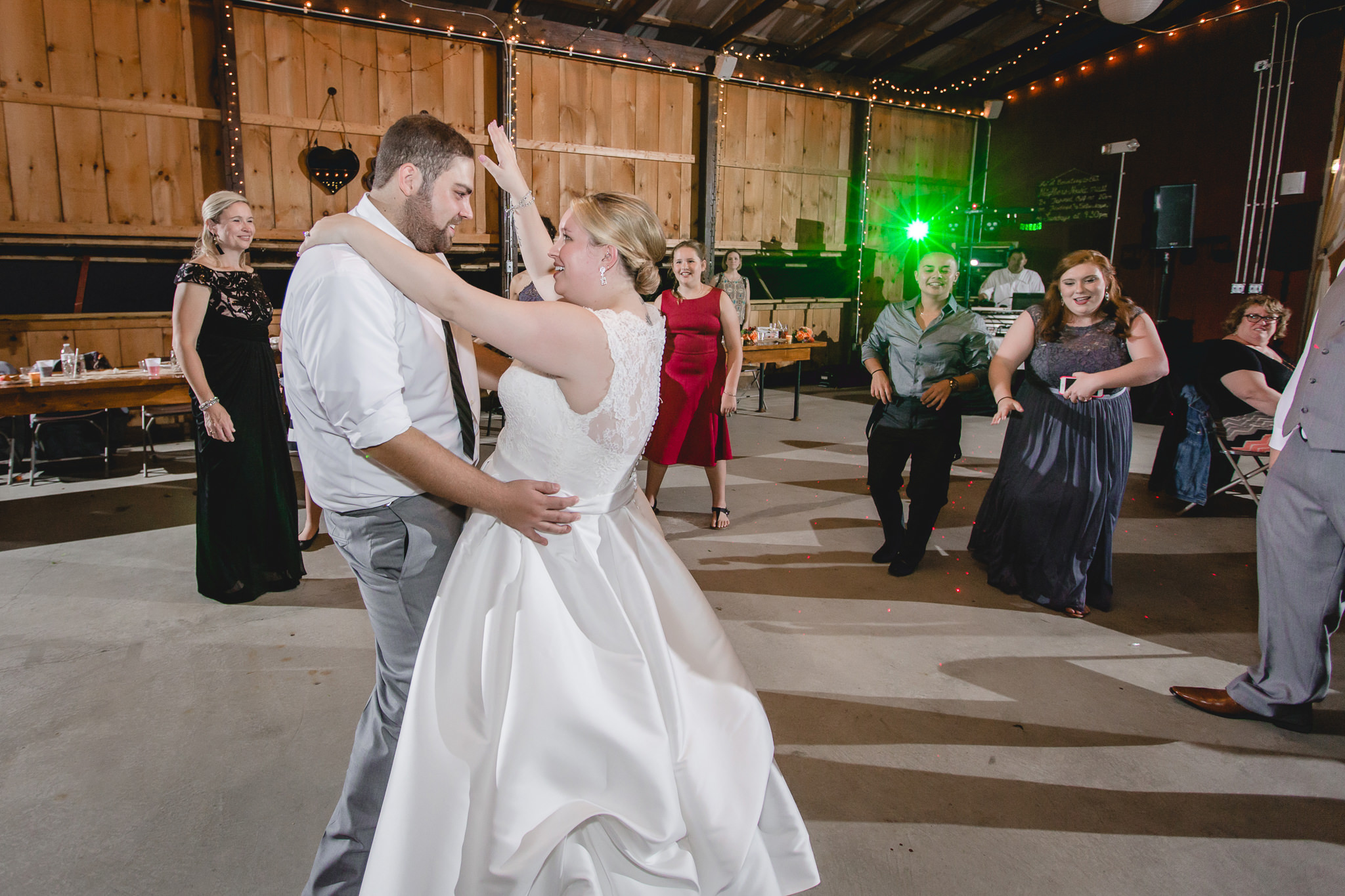 Bride and groom dance at their Barn at Soergel Hollow wedding