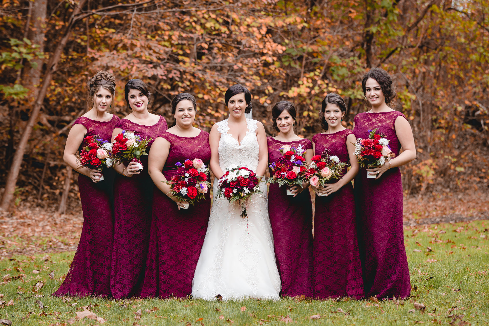 Bride & bridesmaids in wine colored dresses for a fall wedding in Moon Township