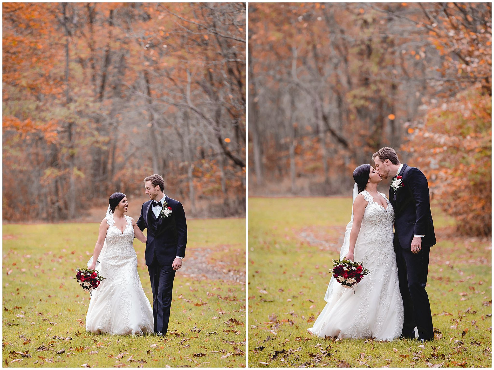 Bride and groom walk in a park of fall foliage on their October wedding day
