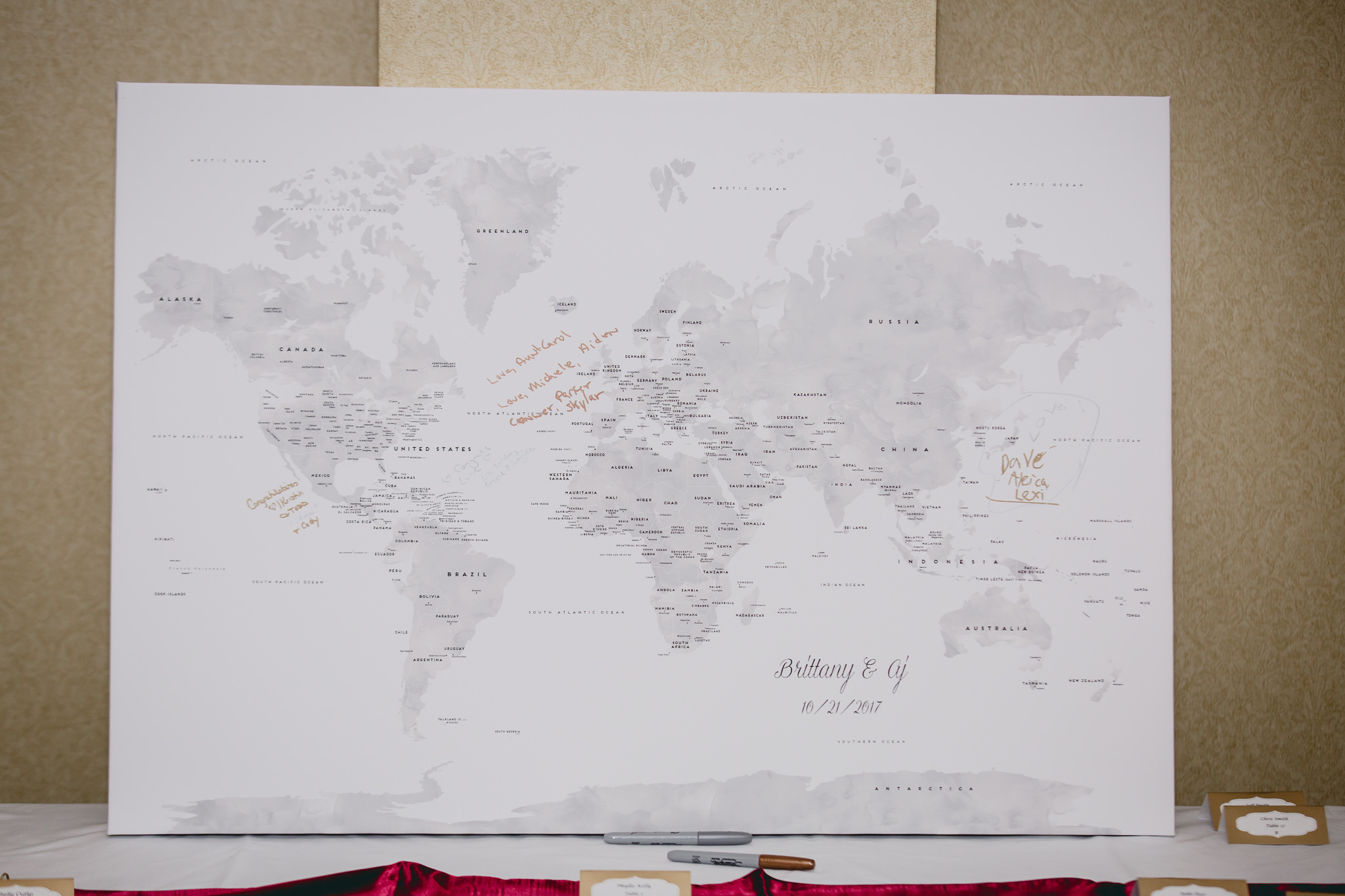 World map is used as the guest book for a DoubleTree Pittsburgh Airport wedding