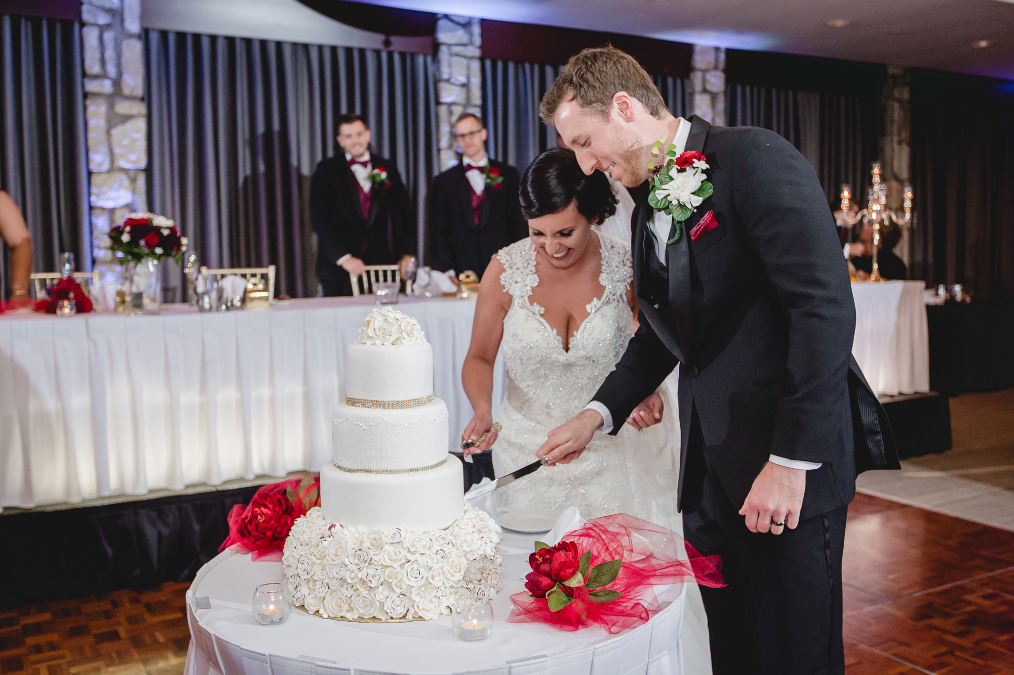 Bride and groom cut the cake at DoubleTree Pittsburgh Airport