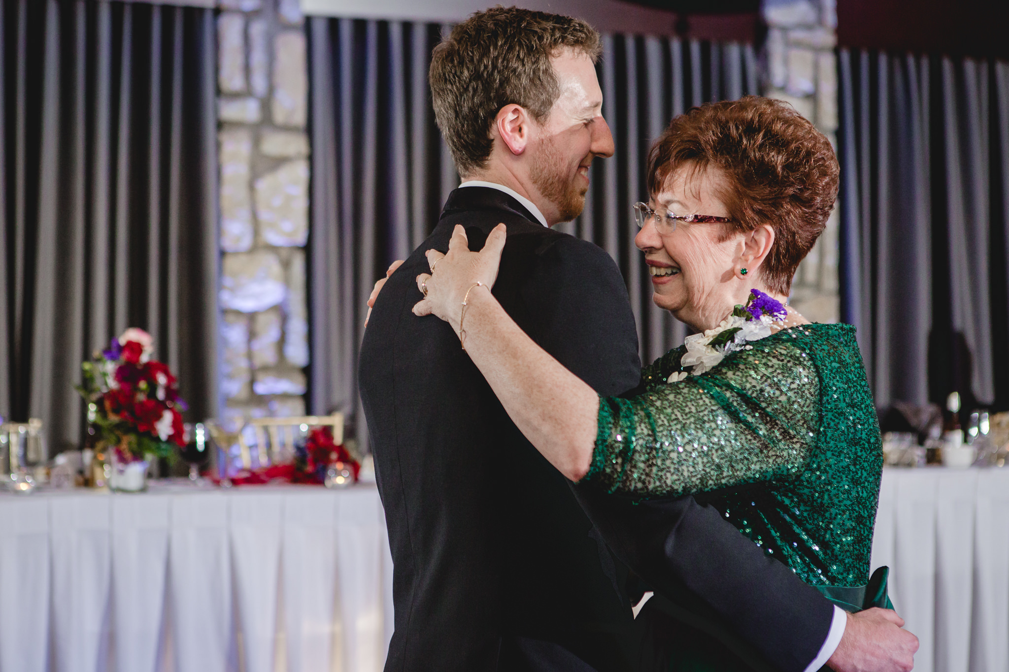 Groom dances with his mother at the DoubleTree Pittsburgh Airport