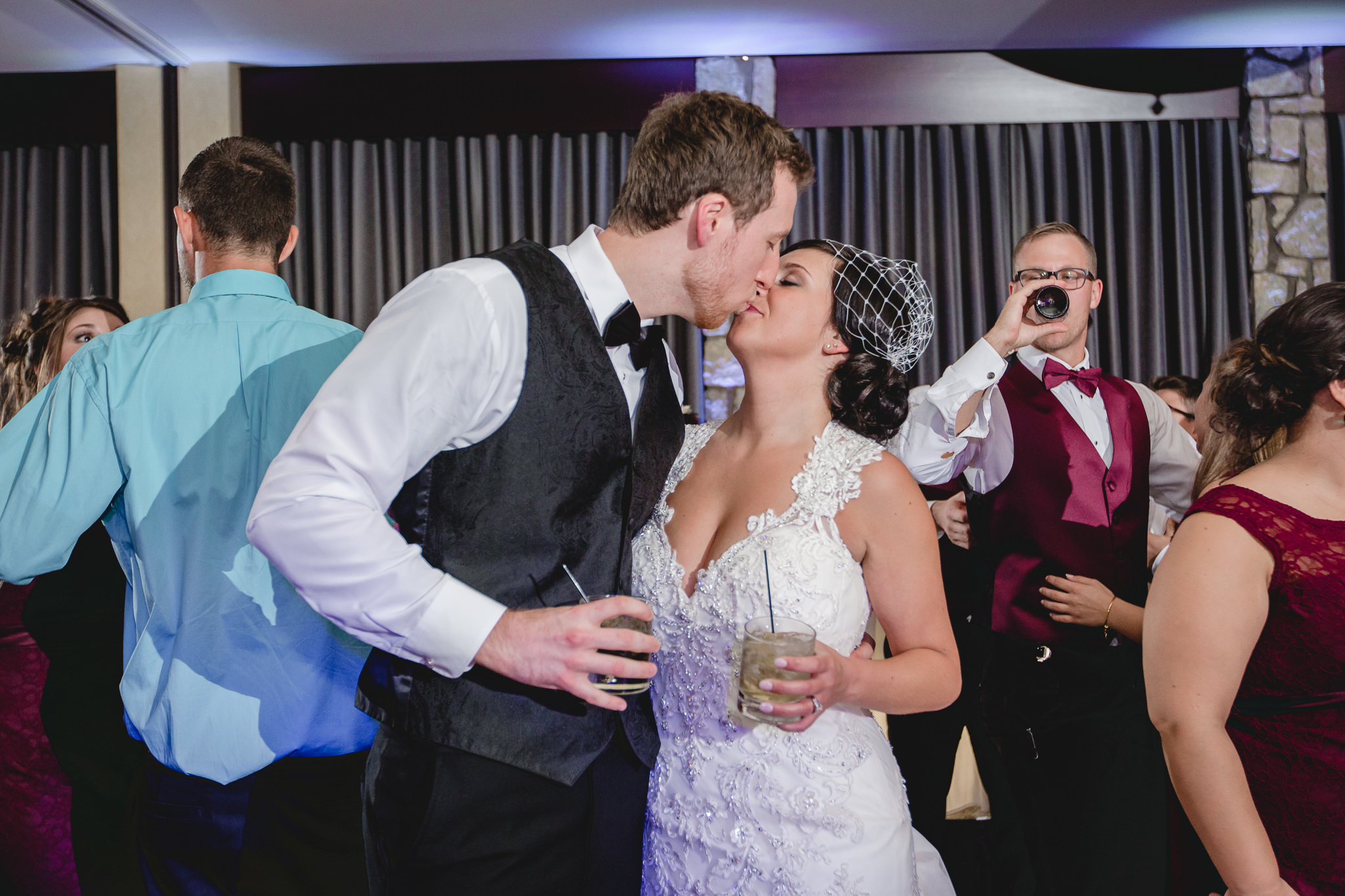 Bride and groom kiss on the dance floor at DoubleTree Pittsburgh Airport