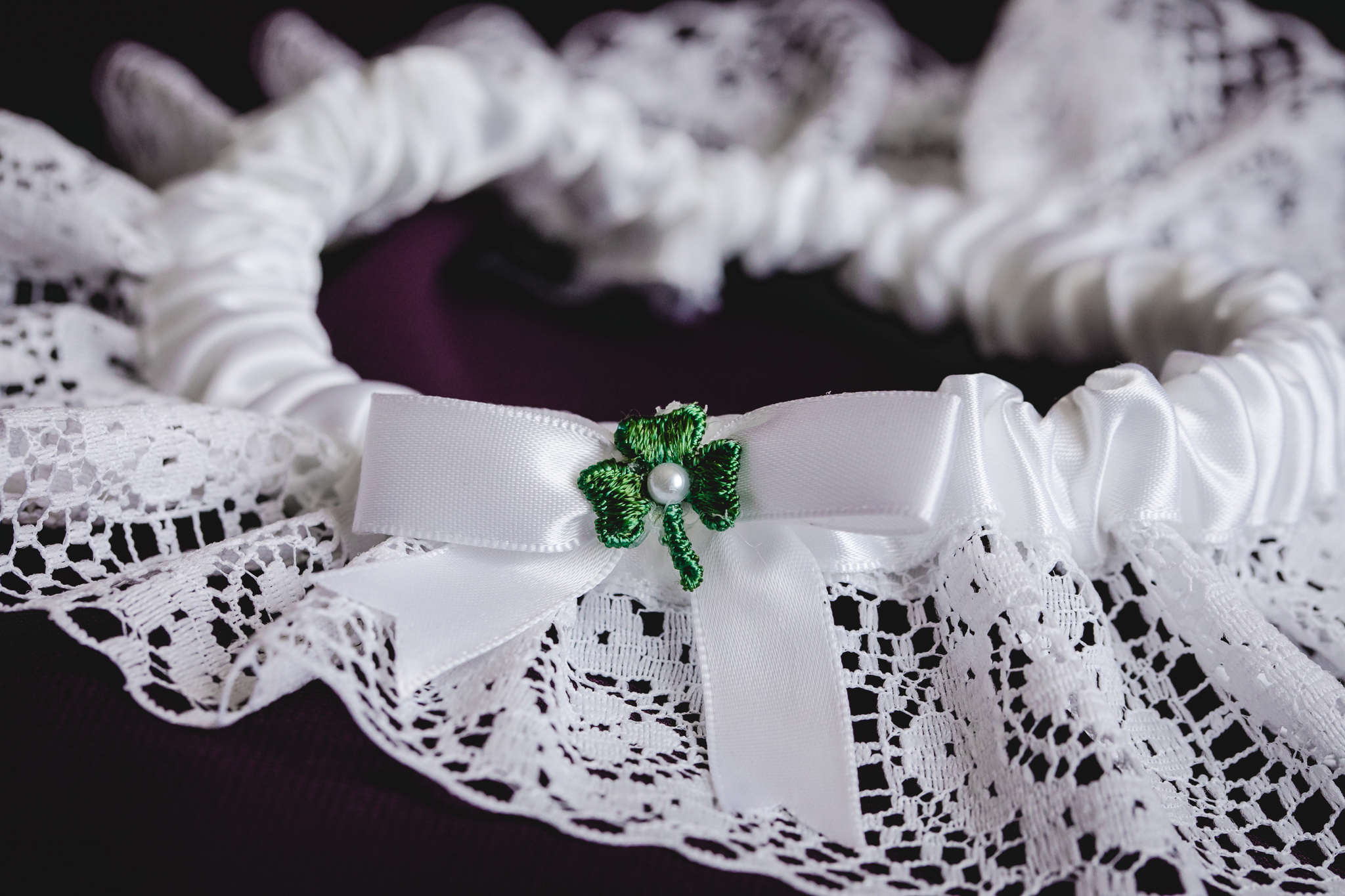 Bride's white garter with green shamrock