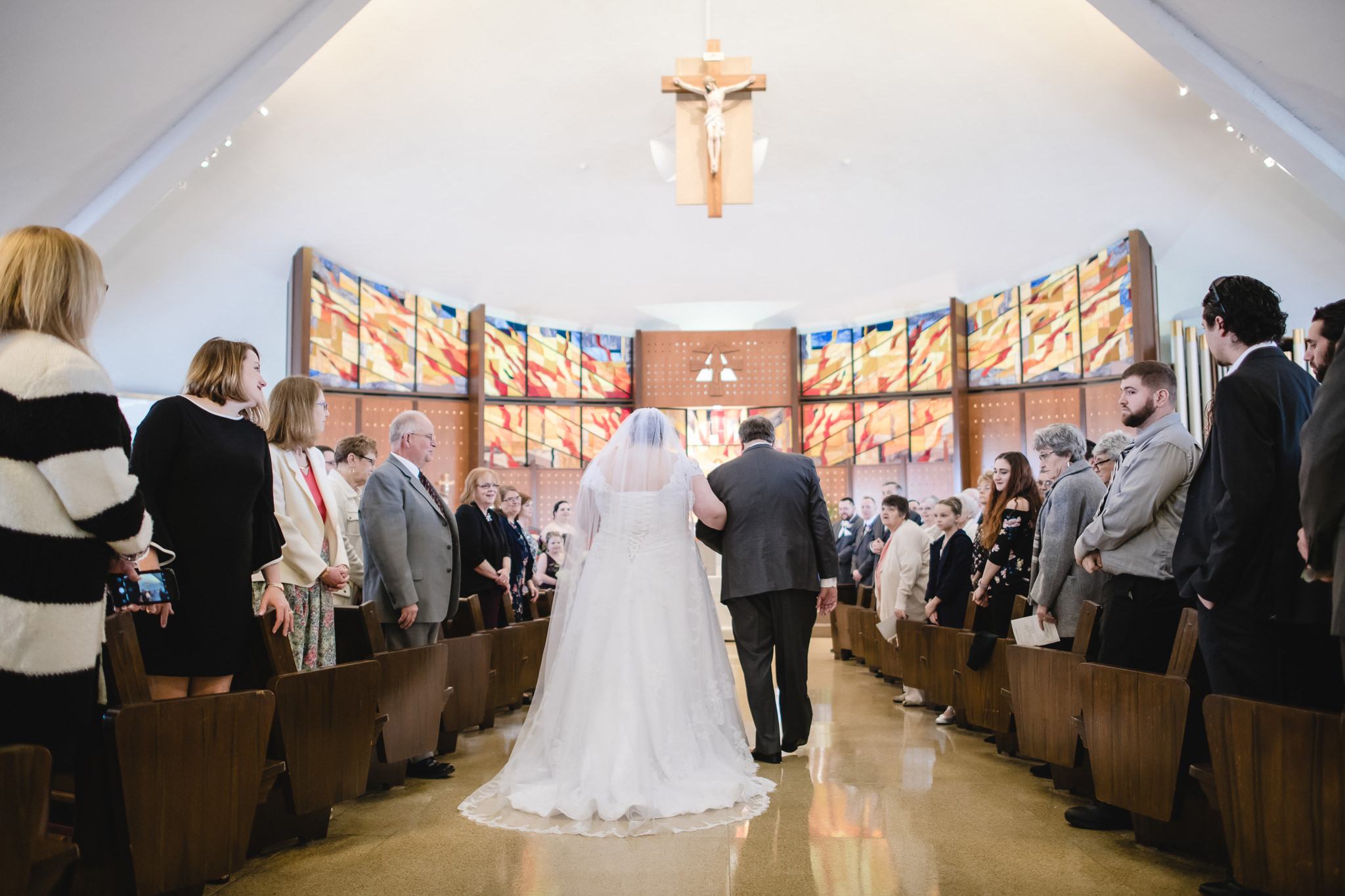 Father walks his daughter down the aisle at Holy Trinity in Robinson