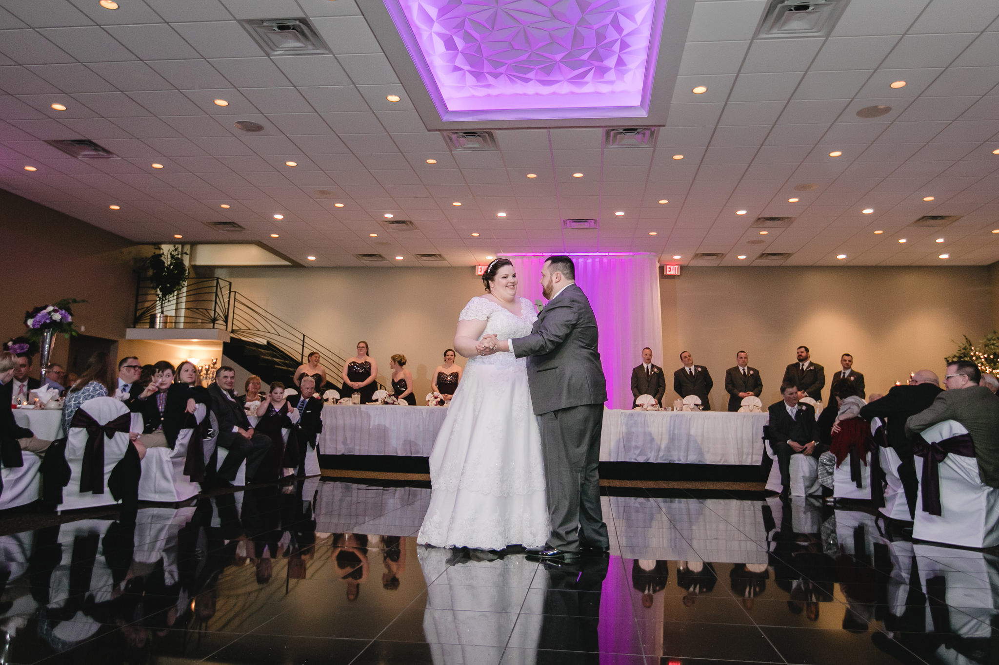 Newlyweds share a first dance in the Balconade Room at the Fez