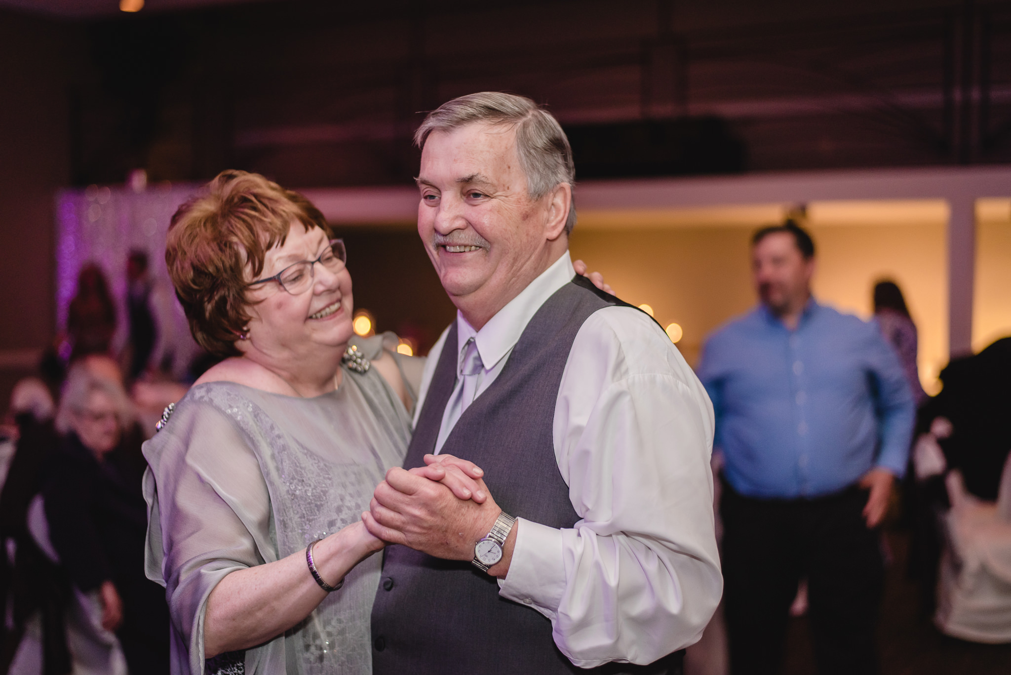 Parents of the groom slow dance at the Fez