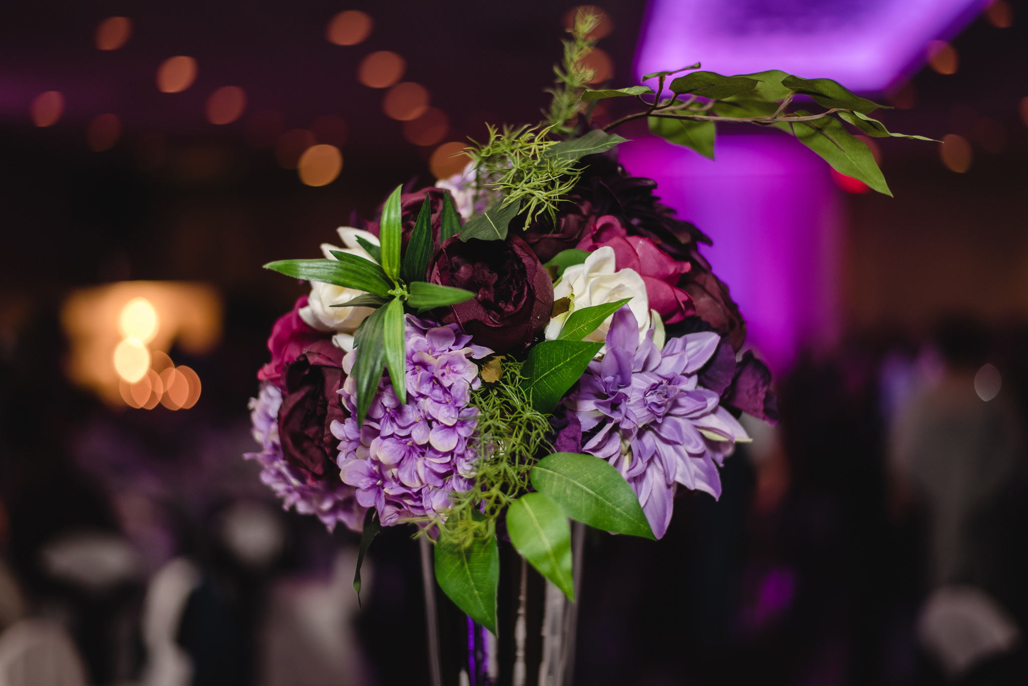 Purple floral centerpiece for a spring wedding at the Fez
