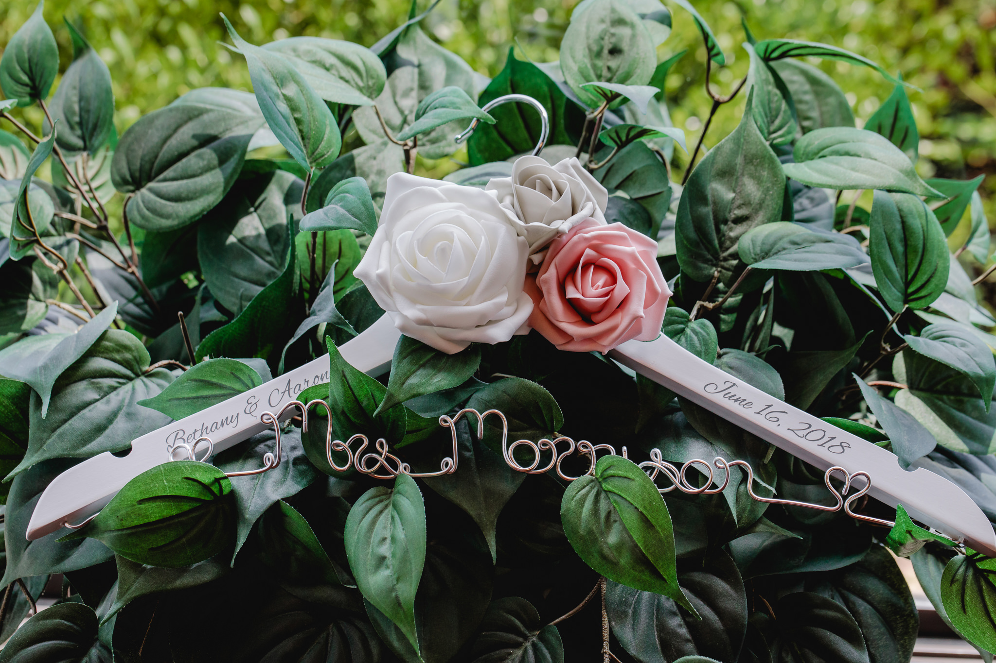 Custom personalized hanger with bride & groom's names and wedding date