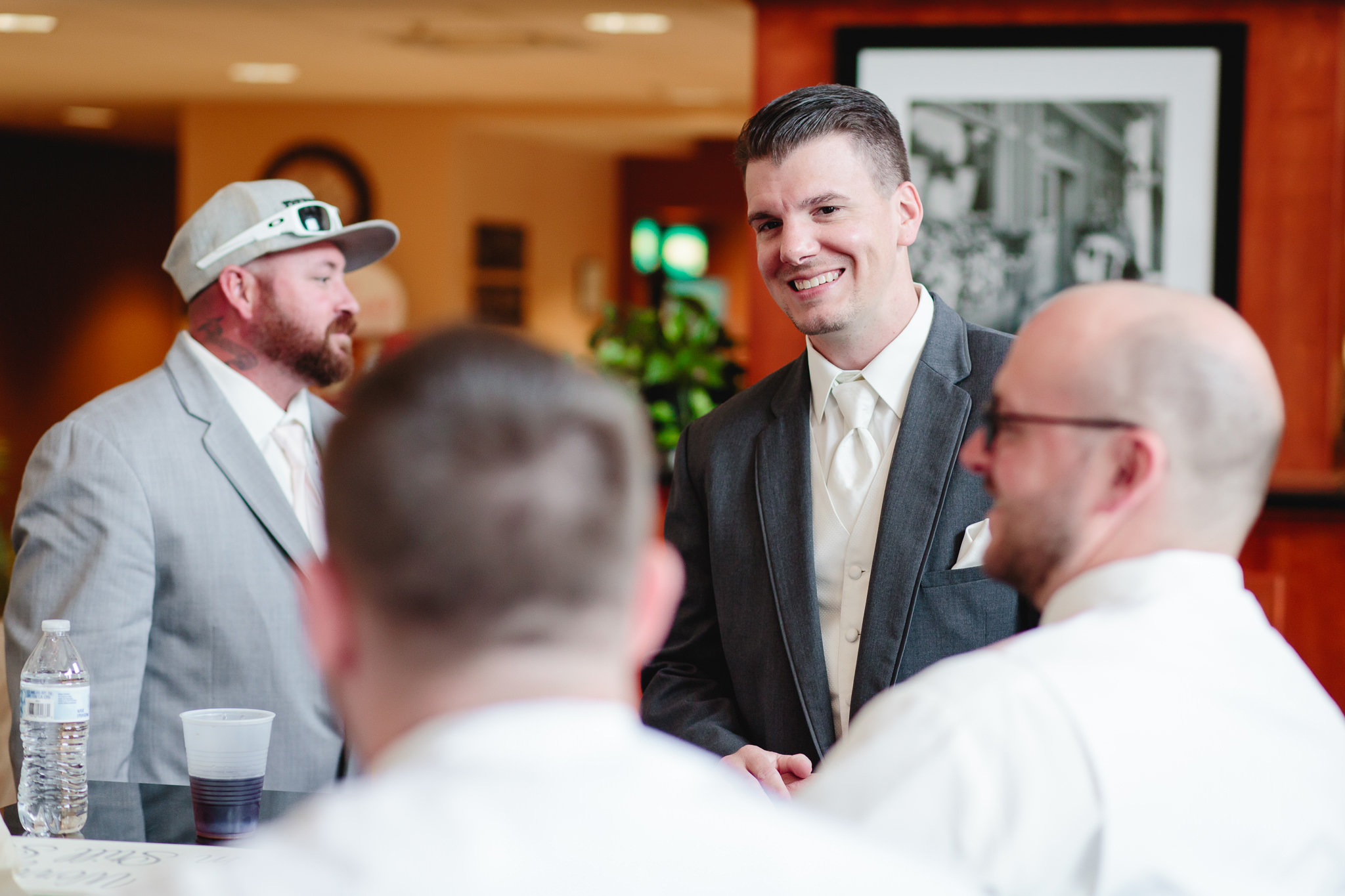 Groom hangs with his groomsmen before his Chestnut Ridge Golf Resort wedding