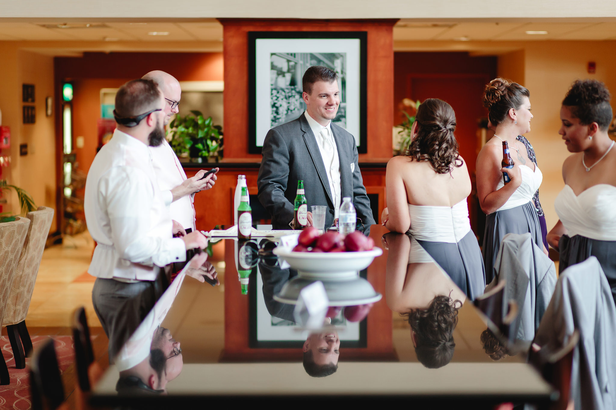 Groom talks with his sisters at Chestnut Ridge Golf Resort