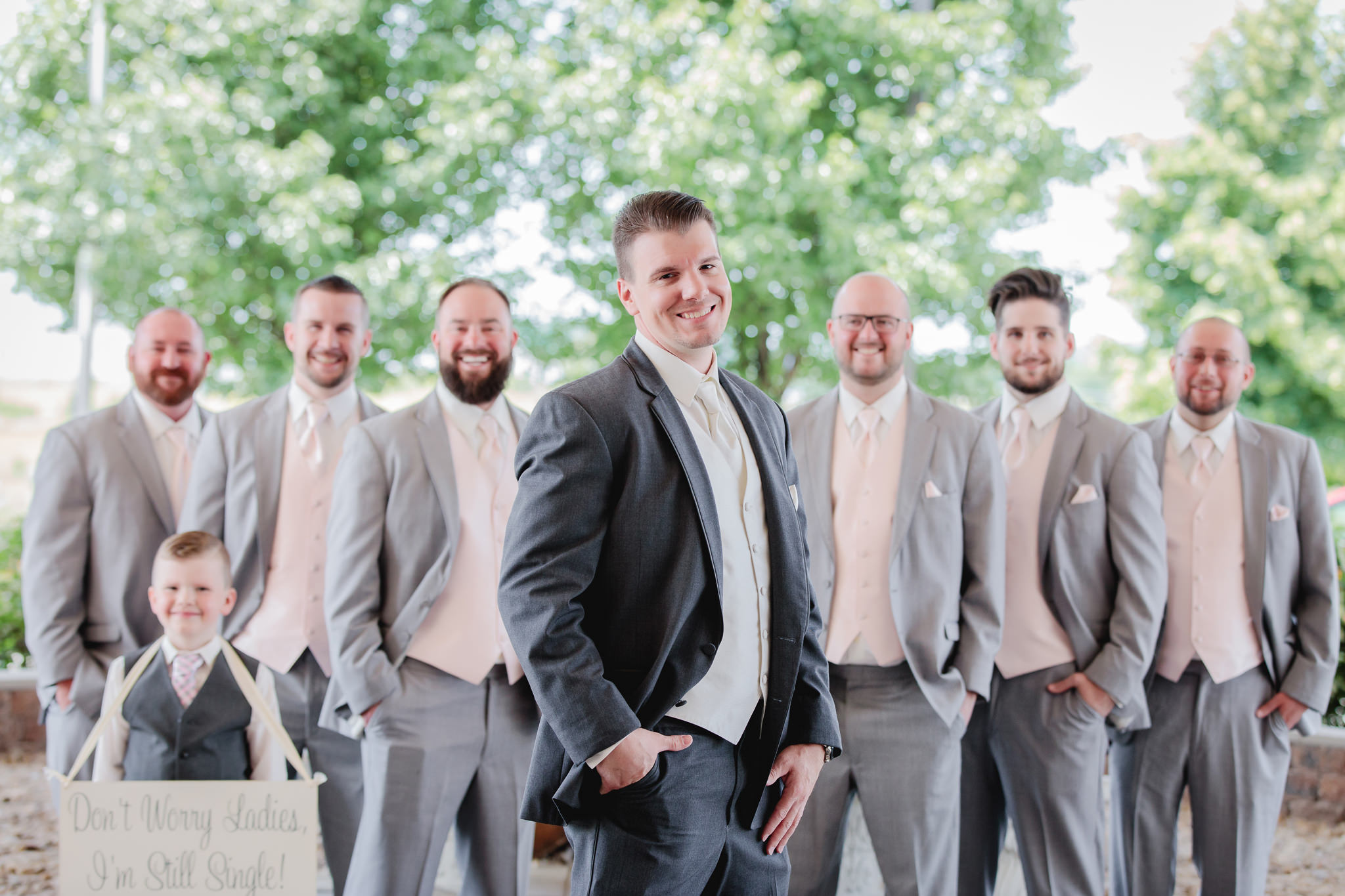 Groom poses with his groomsmen at Chestnut Ridge Golf Resort