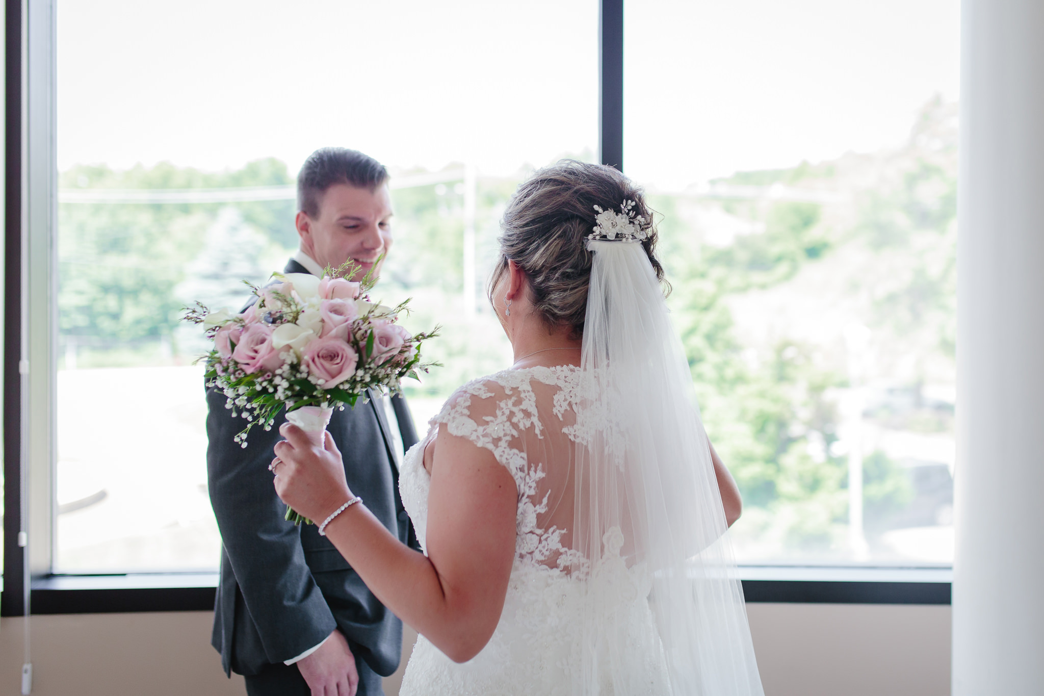Groom sees his bride for the first time at Chestnut Ridge Golf Resort
