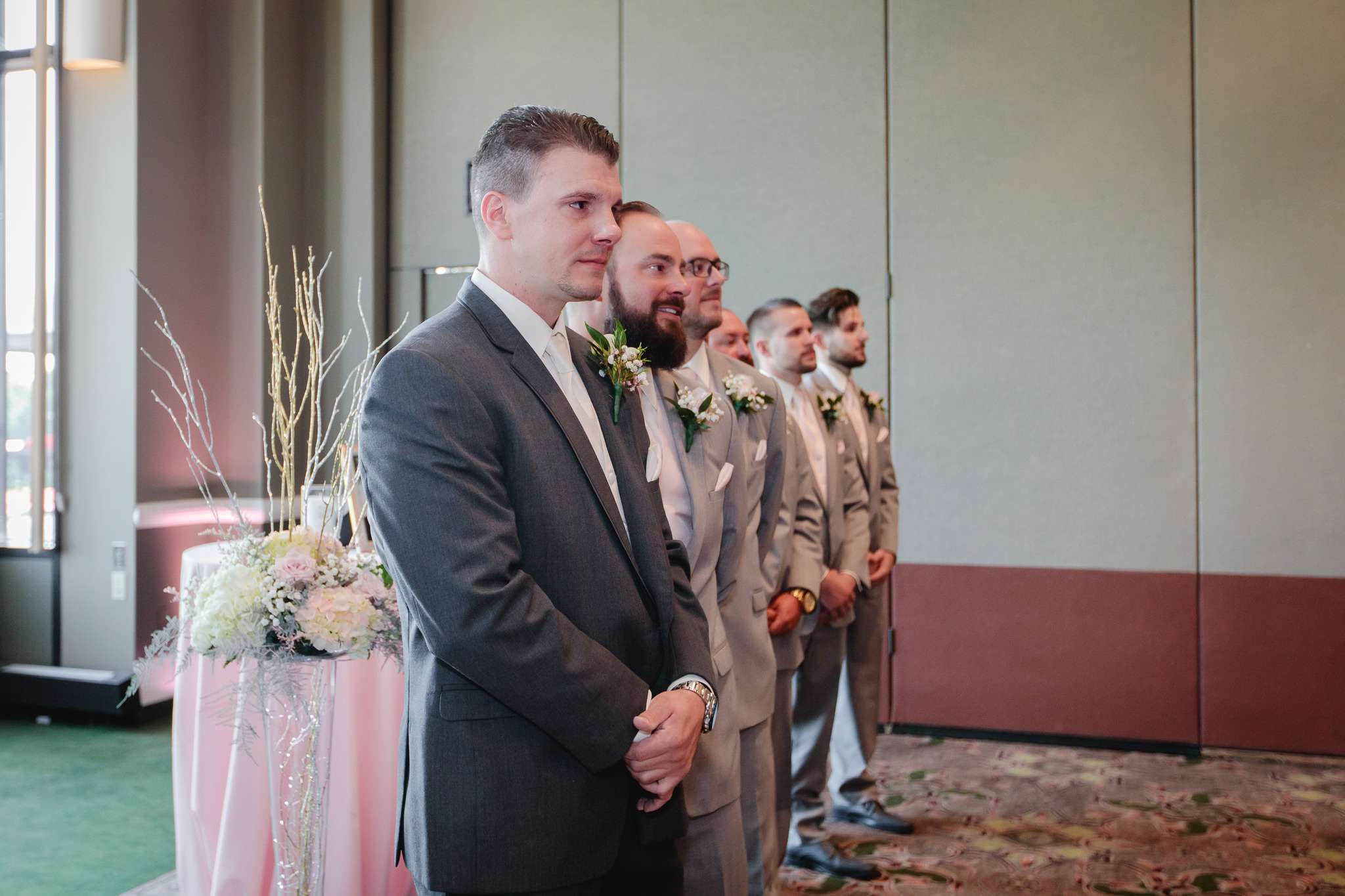 Groom holds back tears seeing his bride walk down the aisle at Chestnut Ridge Golf Resort