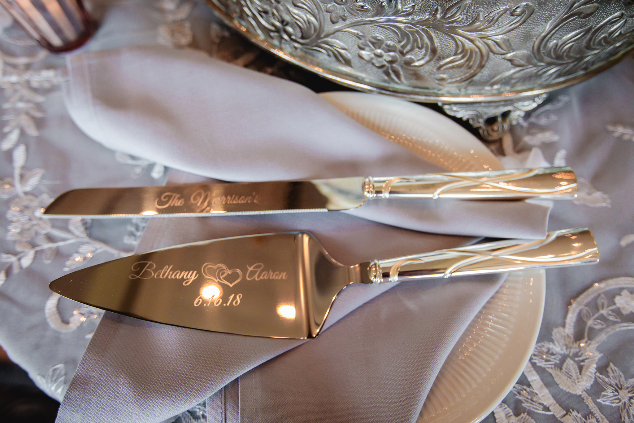Gold plated cake knife at Chestnut Ridge Golf Resort wedding