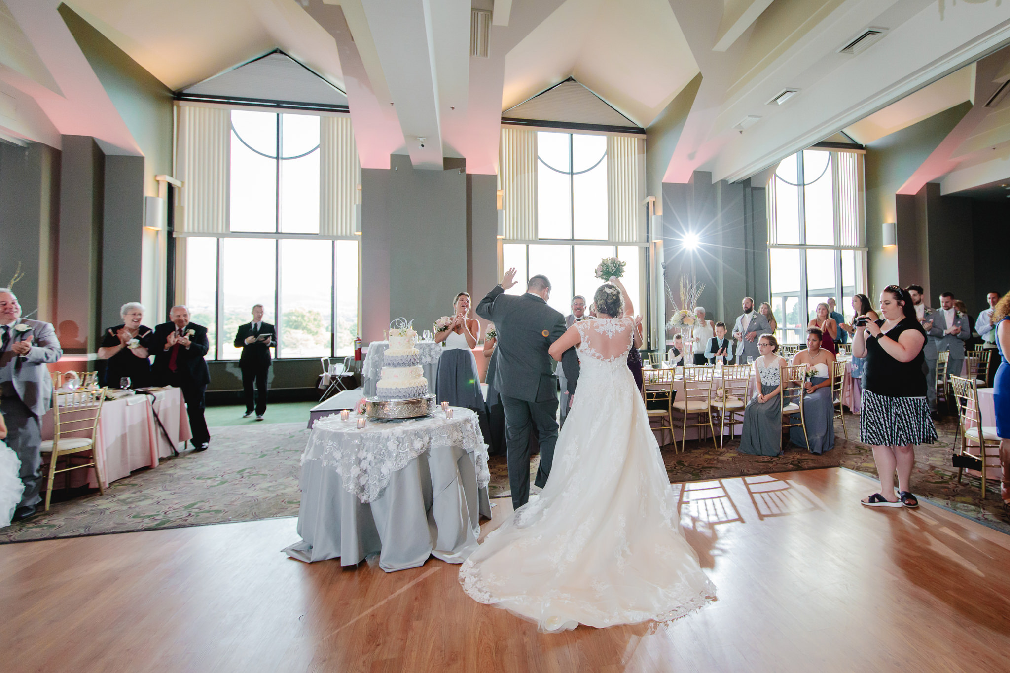 Newlyweds are greeted by friends and family at their Chestnut Ridge Golf Resort reception