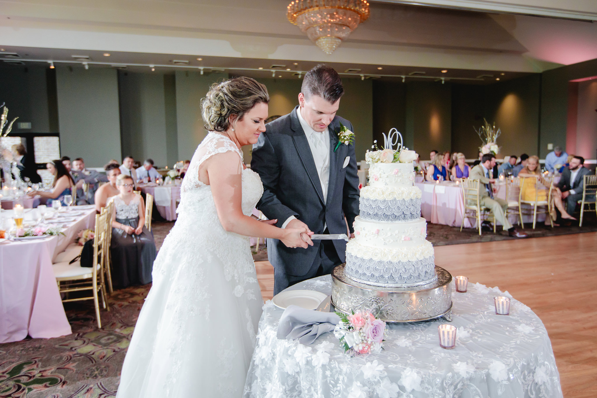 Cake cutting at a Chestnut Ridge Golf Resort wedding