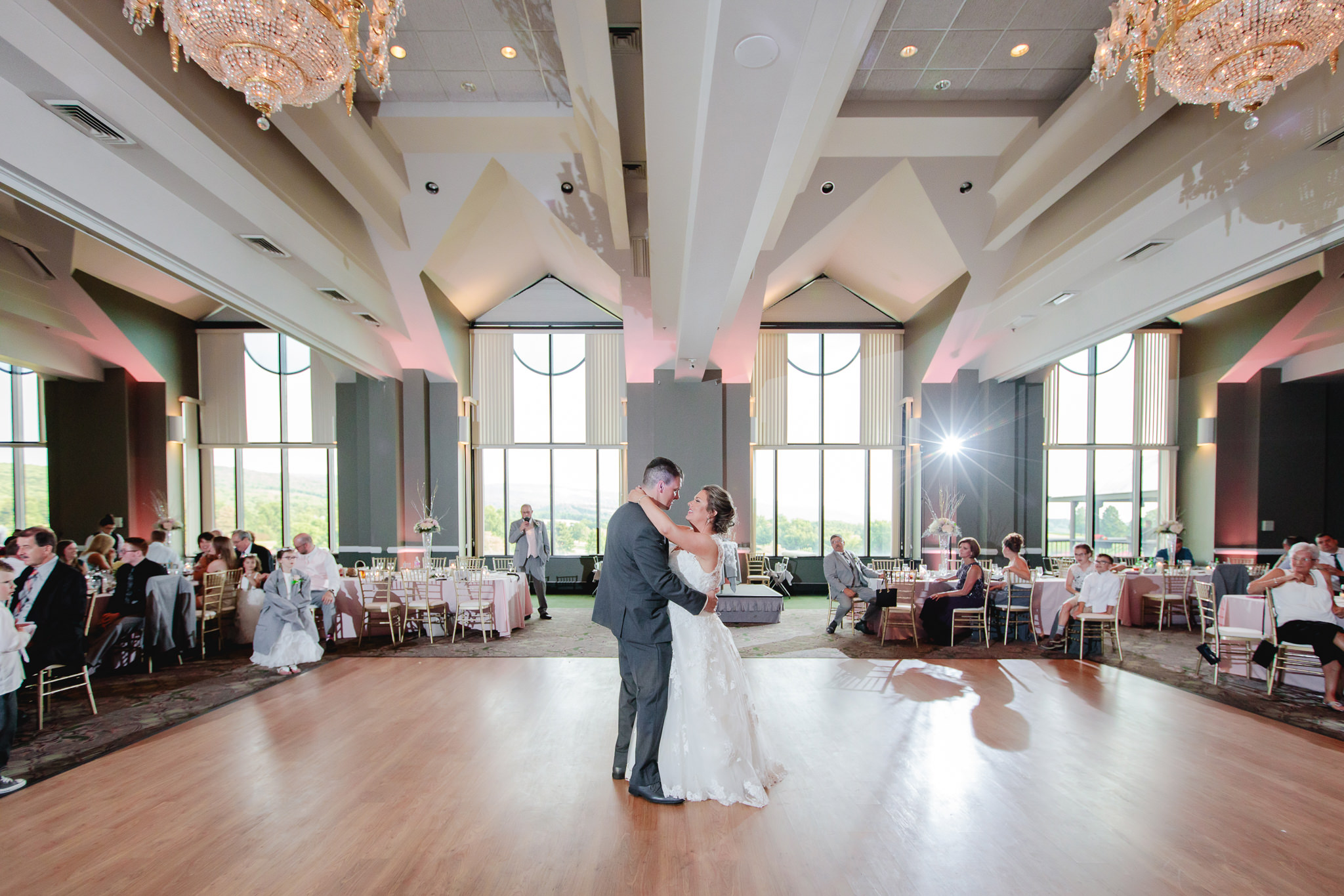 Bride and groom share a first dance at a Chestnut Ridge Golf Resort ballroom