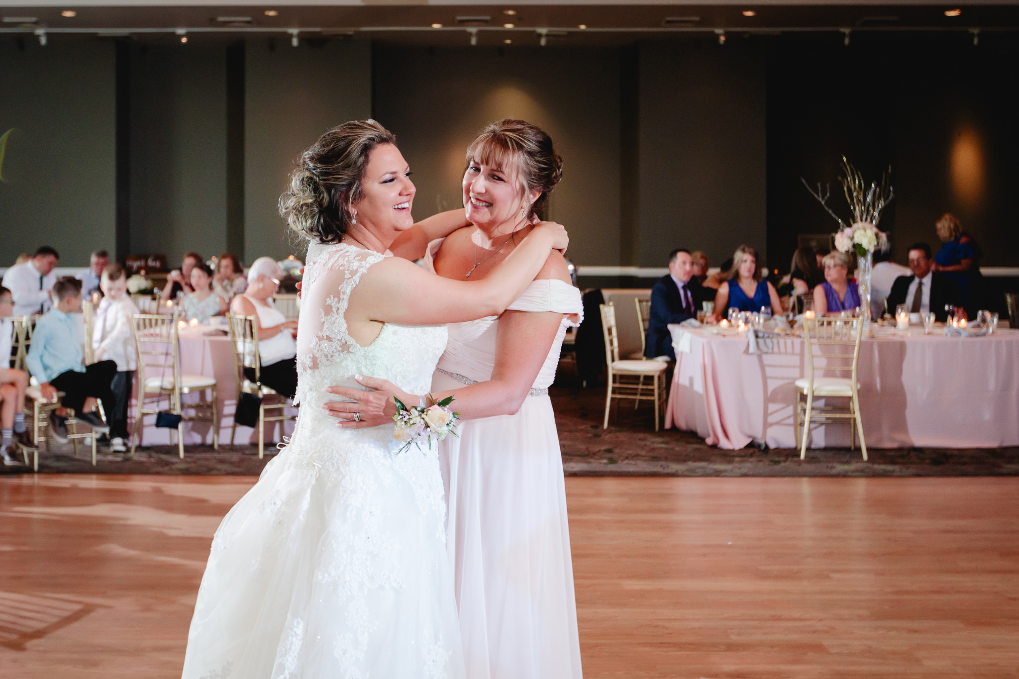 Bride dances with her mother at Chestnut Ridge Golf Resort