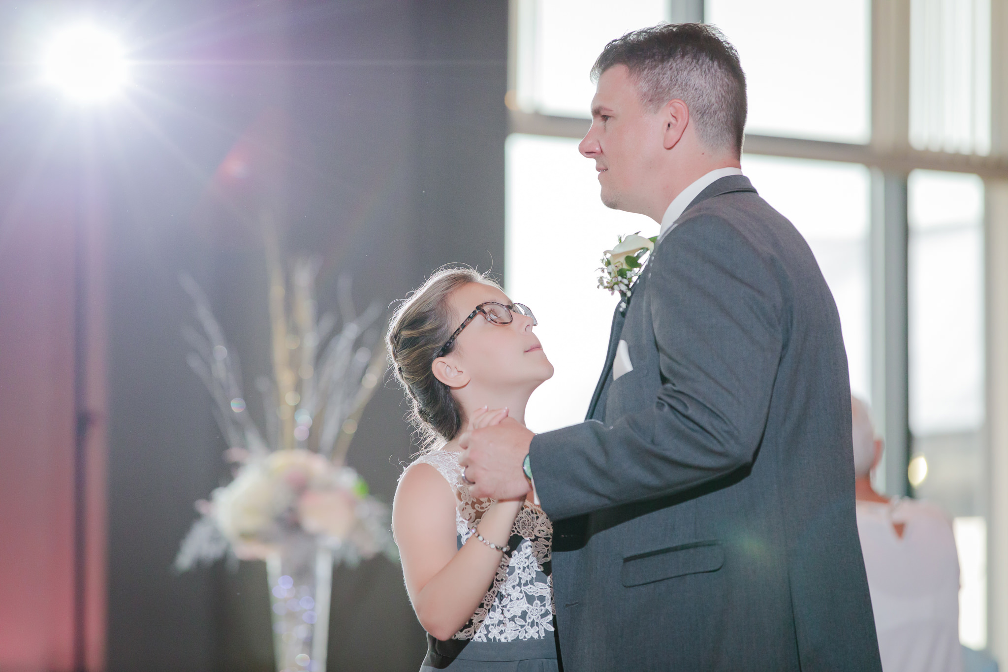 Groom dances with his daughter at Chestnut Ridge Golf Resort