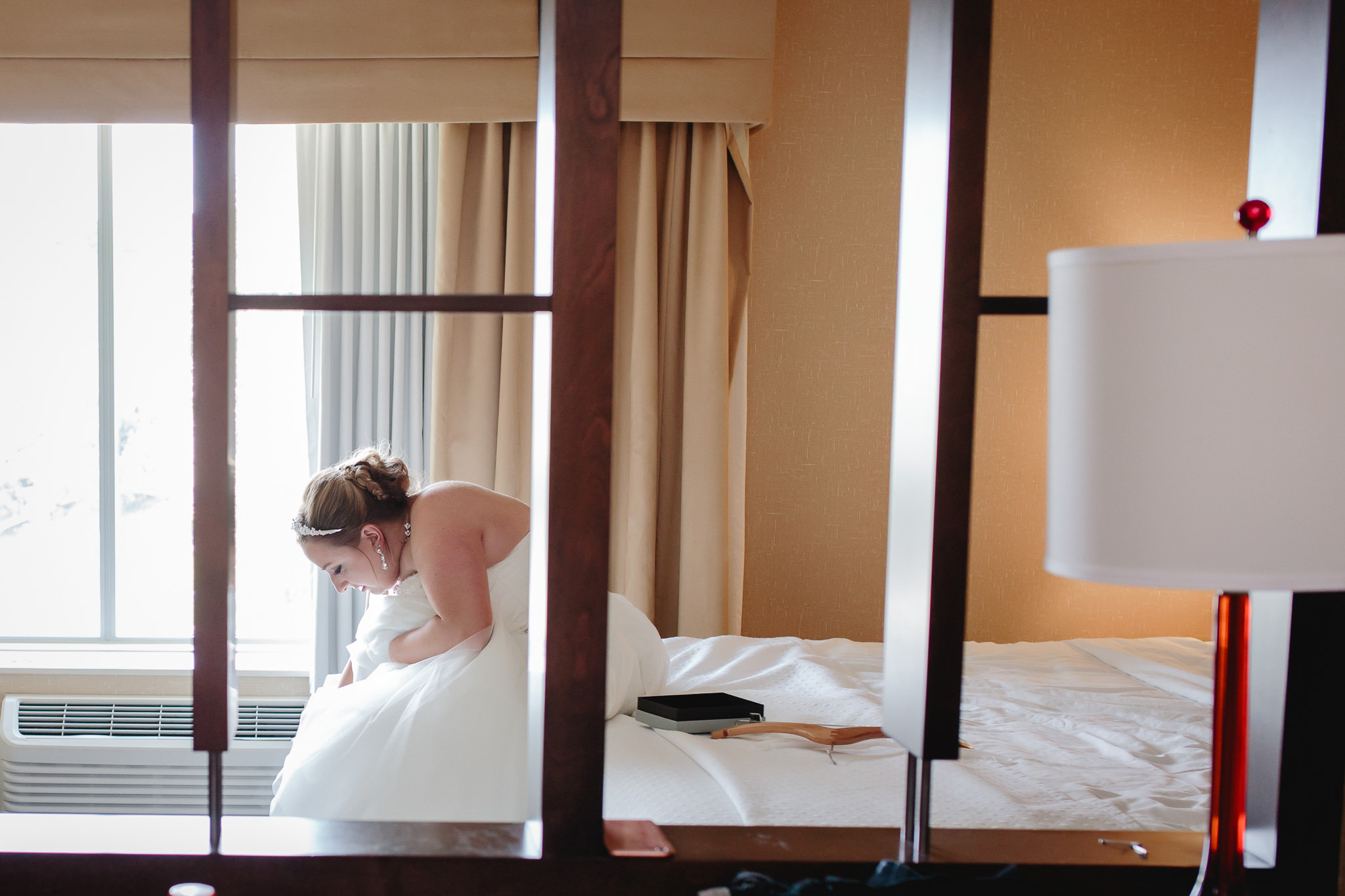 Bride puts on her shoes before her Duquesne University wedding
