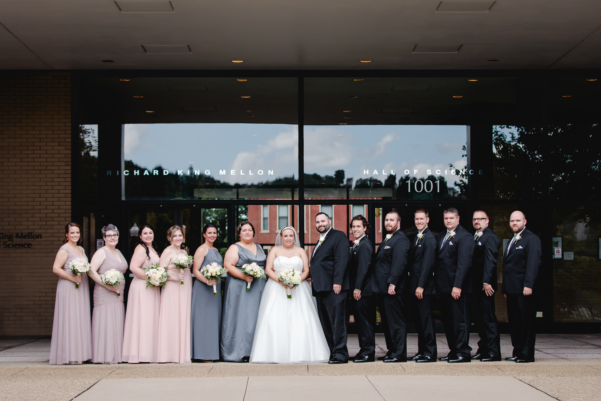 Bridal party poses for a group photos at Duquesne University