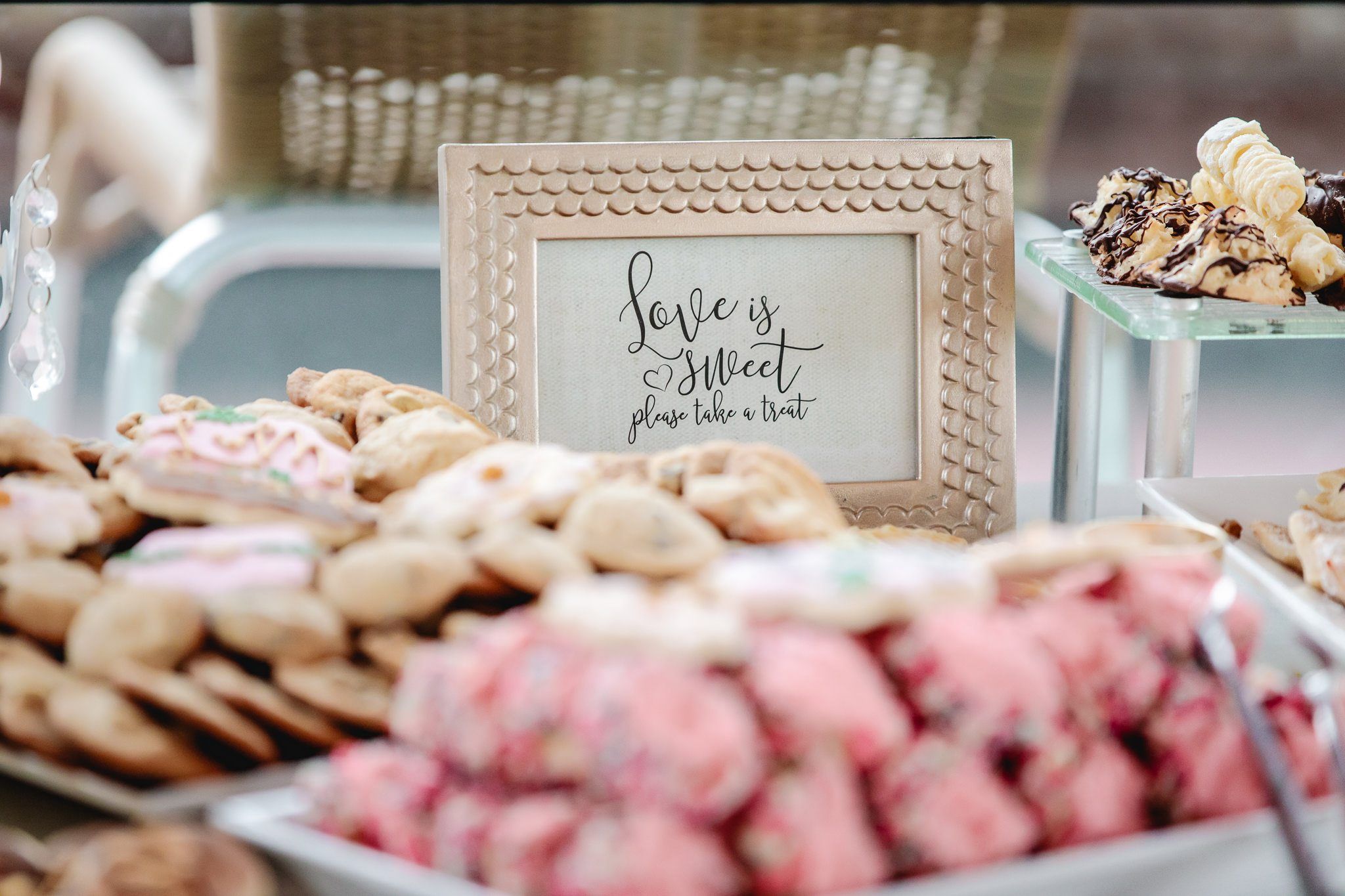 Love is Sweet sign on the cookie table at a Duquesne University wedding